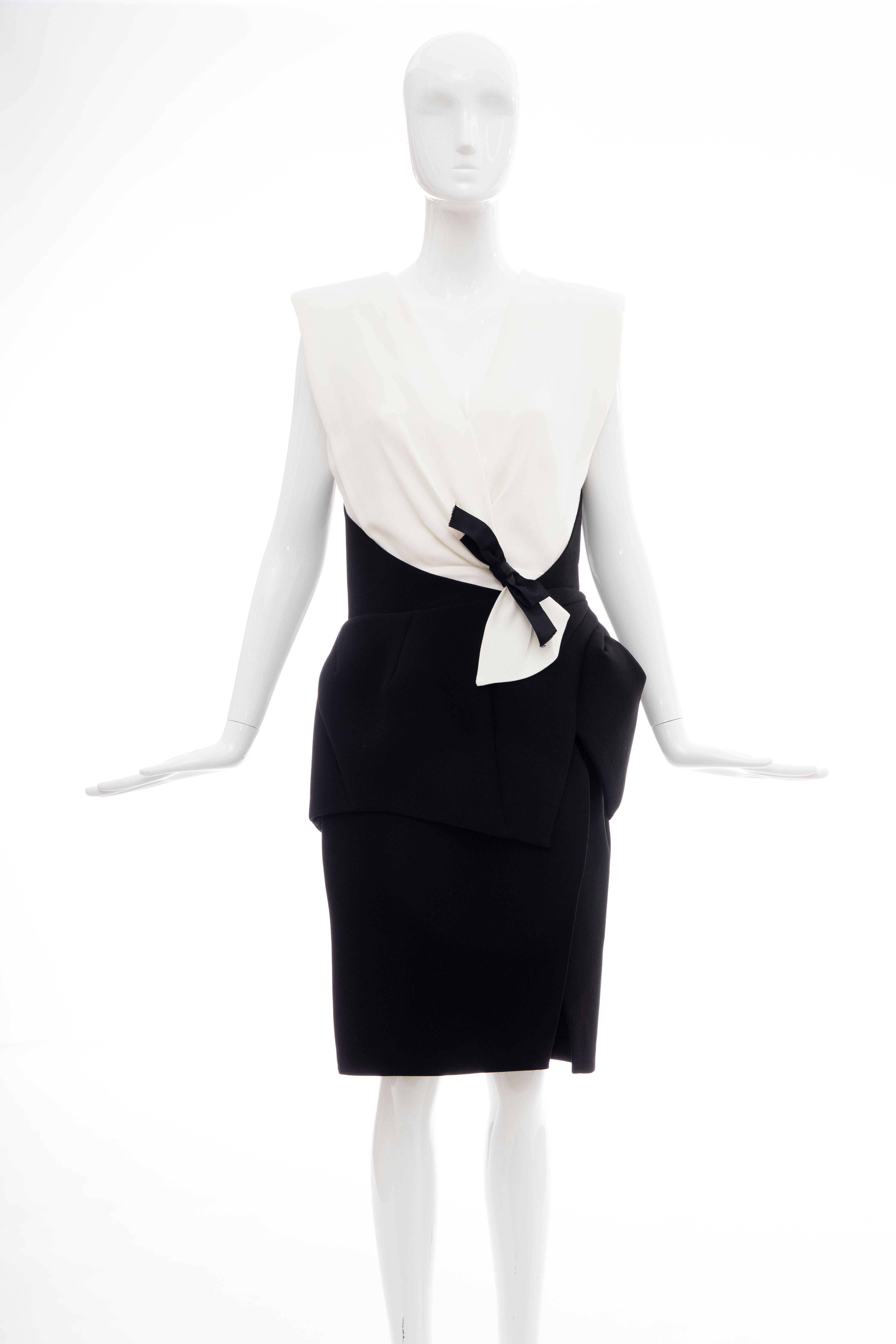Nicolas Ghesquière for Balenciaga Runway Fall 2008 black and white dress with structured shoulders, bow accent at waist, concealed zip closure at back and built-in bra.

FR. 40, US. 8

Fabric: 71% Acetate, 29% Polyester; Combo 52% Viscose, 48%