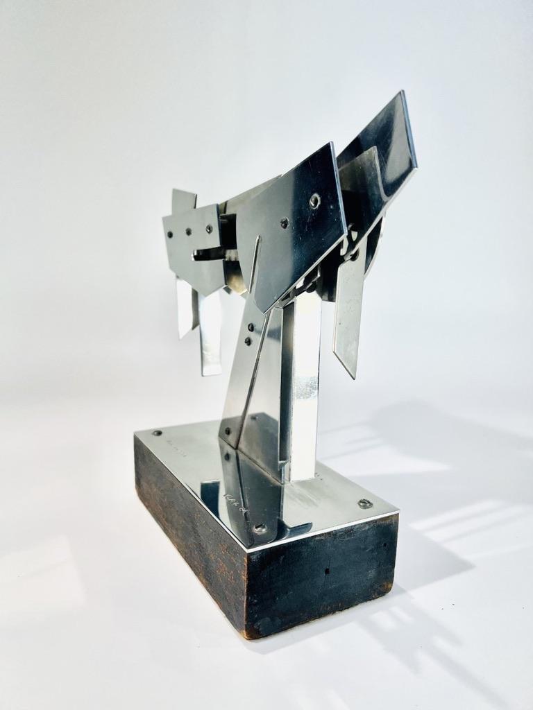 International Style Nicolas Vlavianos Greek steel 1974 sculpture with wood base signed For Sale