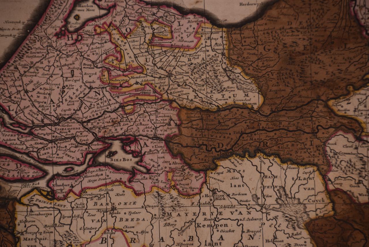 Belgium and the Netherlands: A Hand-colored 17th Century Map by Visscher - Other Art Style Print by Nicolaus Visscher