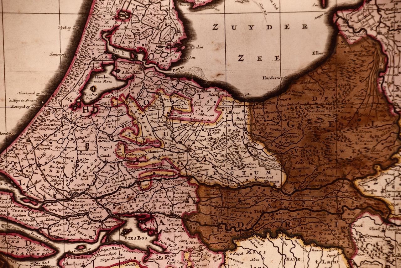 Belgium and the Netherlands: A Hand-colored 17th Century Map by Visscher - Beige Landscape Print by Nicolaus Visscher