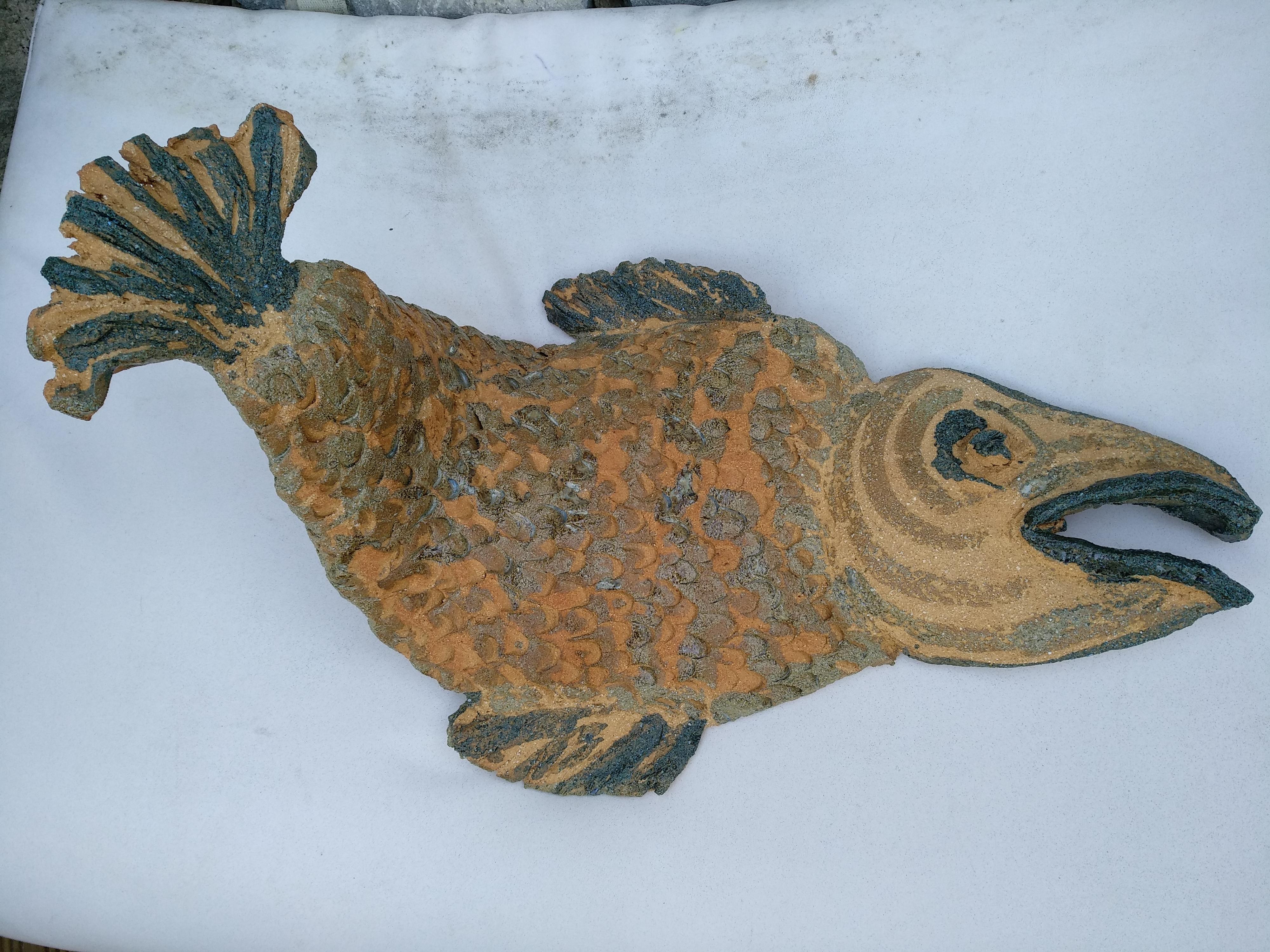 Part of Nicole Durand maritime collection, this colorful imaginary fish is done in ceramic.
As a stone carver, Nicole Durand shows all the movements and details in the fish, like the wave energy, that makes him look very alive…... 
It can be used as