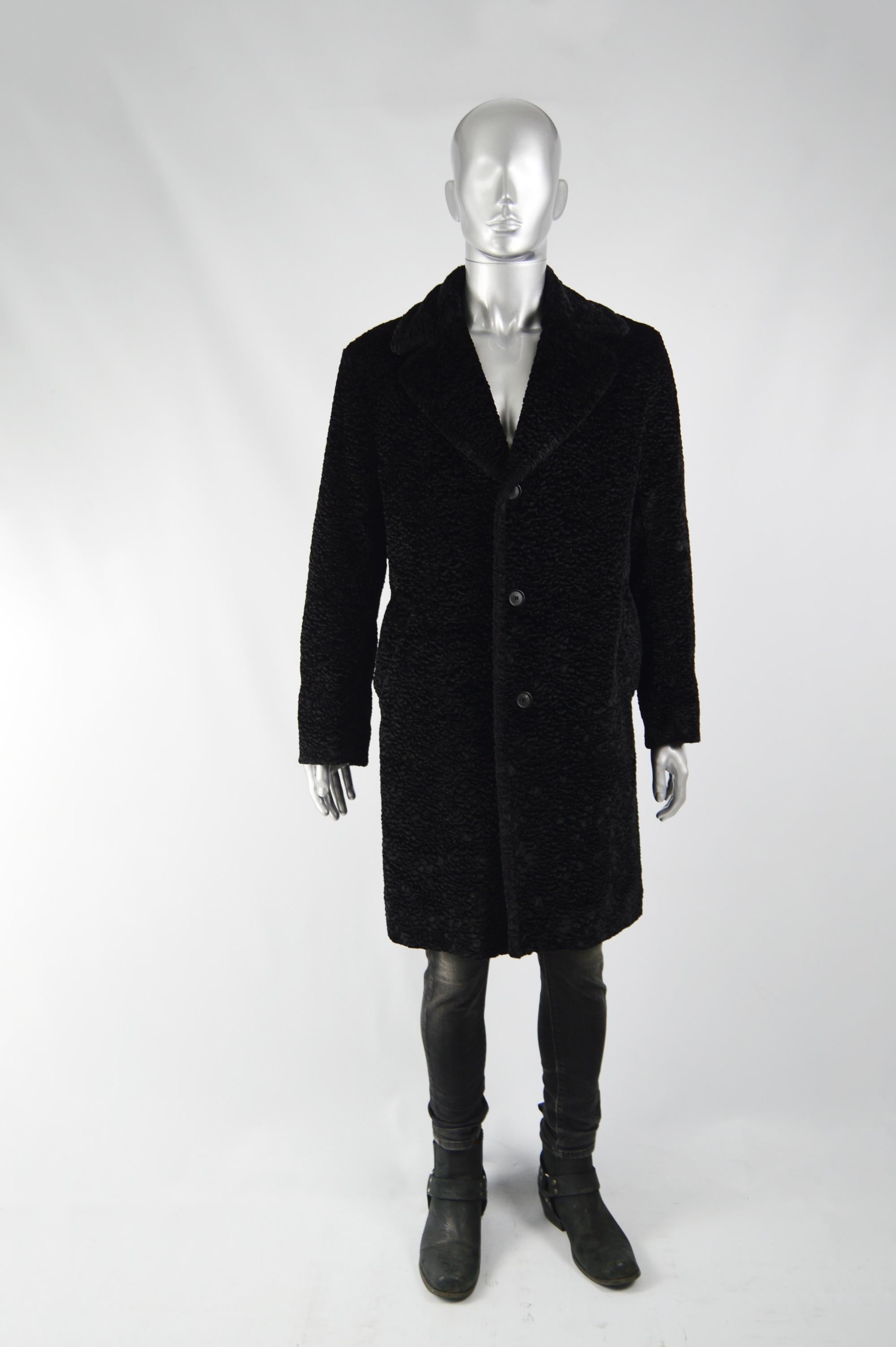 An excellent and very rare vintage overcoat by luxury British fashion designer, Nicole Farhi. In a black faux Astrakhan style fabric which gives an expensive and classic look. 

Size: Unlabelled; fits like a men's Medium to Large.
Chest - 44” /