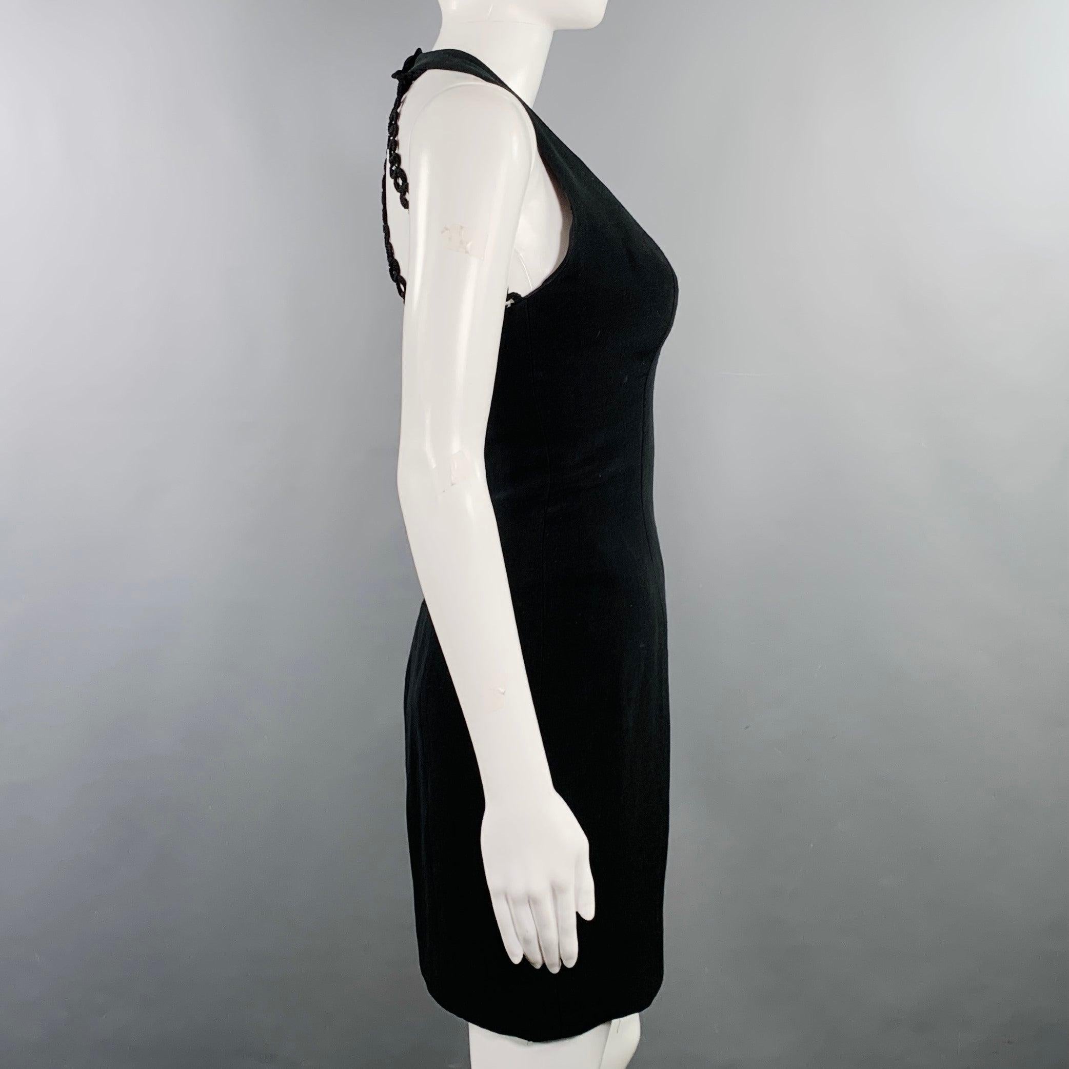 NICOLE MILLER for ANN TAYLOR cocktail dress
in a
black rayon fabric featuring a halter style, open back design with braided straps, and back zipper closure. Made in USA.Excellent Pre-Owned Condition. 

Marked:   2 

Measurements: 
 
Shoulder: 7
