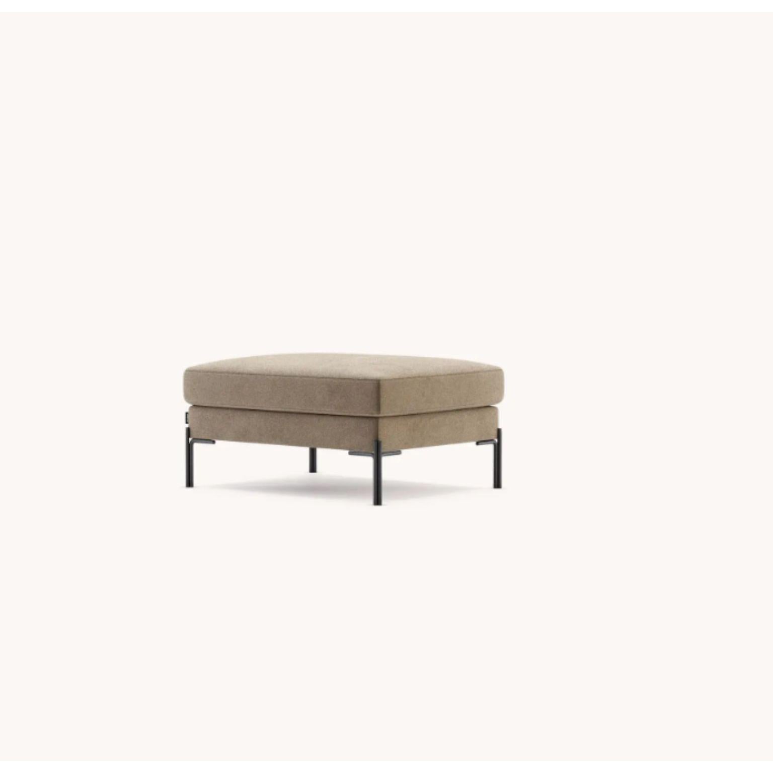 Nicole Pouf by Domkapa
Materials: velvet (Neva 2206), black texturized steel. 
Dimensions: W 94 x D 74 x H 44 cm.
Also available in different materials. 

A British-inspired design is what best defines Nicole sofa. With classic style, it