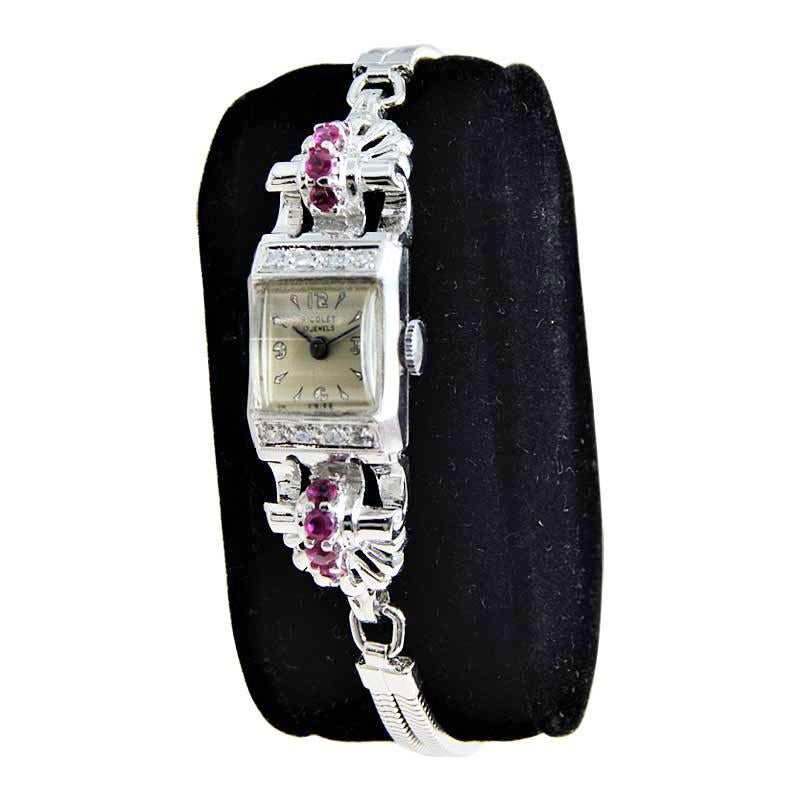 FACTORY / HOUSE: Nicolet Watch Company
STYLE / REFERENCE: Art Deco 
METAL / MATERIAL: 14kt Solid White Gold Associated Matching Steel Bracelet
CIRCA / YEAR: 1940's
DIMENSIONS / SIZE: Length 44mm x Diameter 14mm
MOVEMENT / CALIBER: Manual Winding 17
