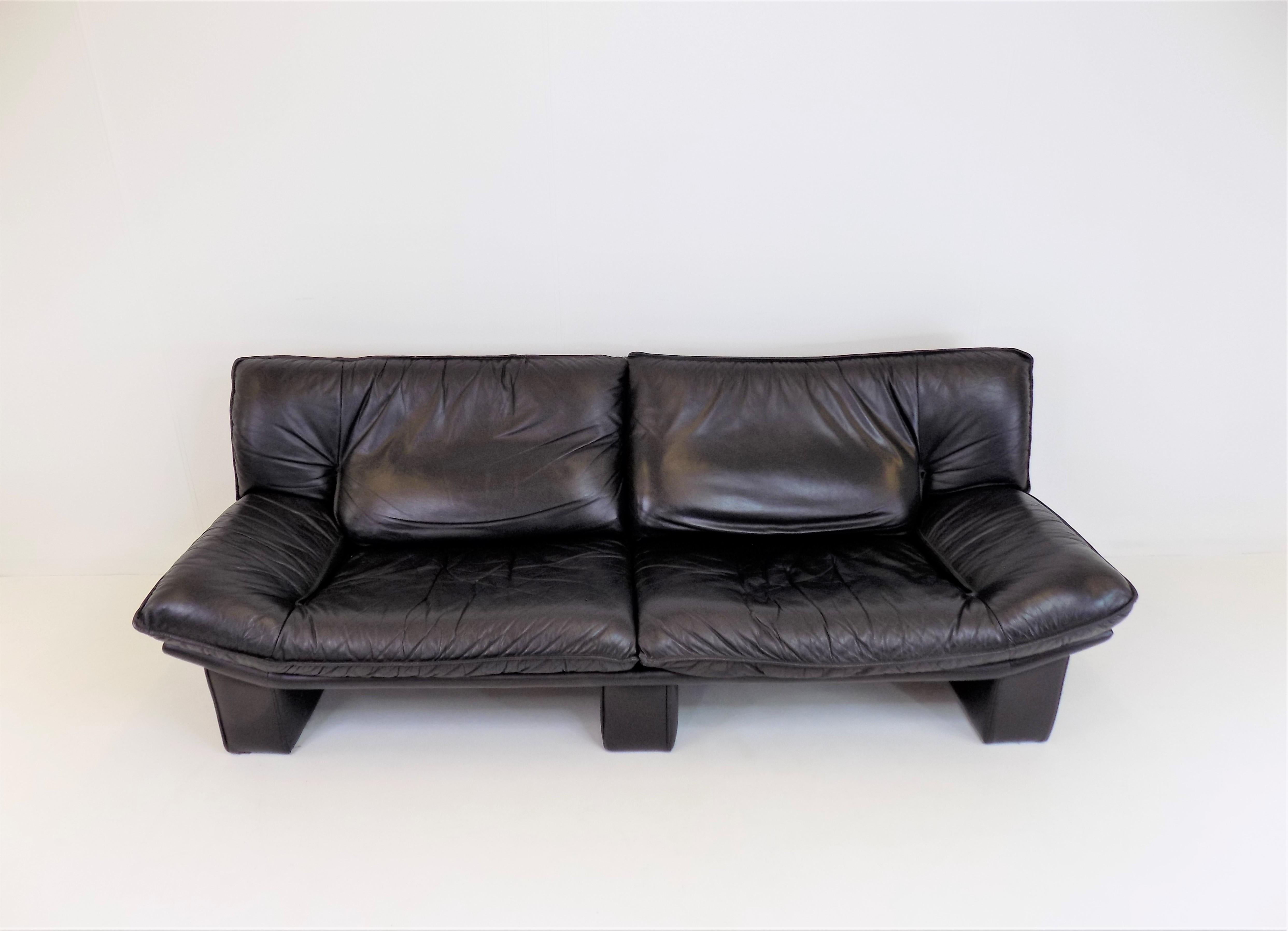 An Ambassador 3 seater black leather sofa in excellent condition. The sofa has soft leather which is in very good condition. The massive, also leather,  L pillars of the sofa are undamaged.

 

The sofa was designed by the Italian manufacturer