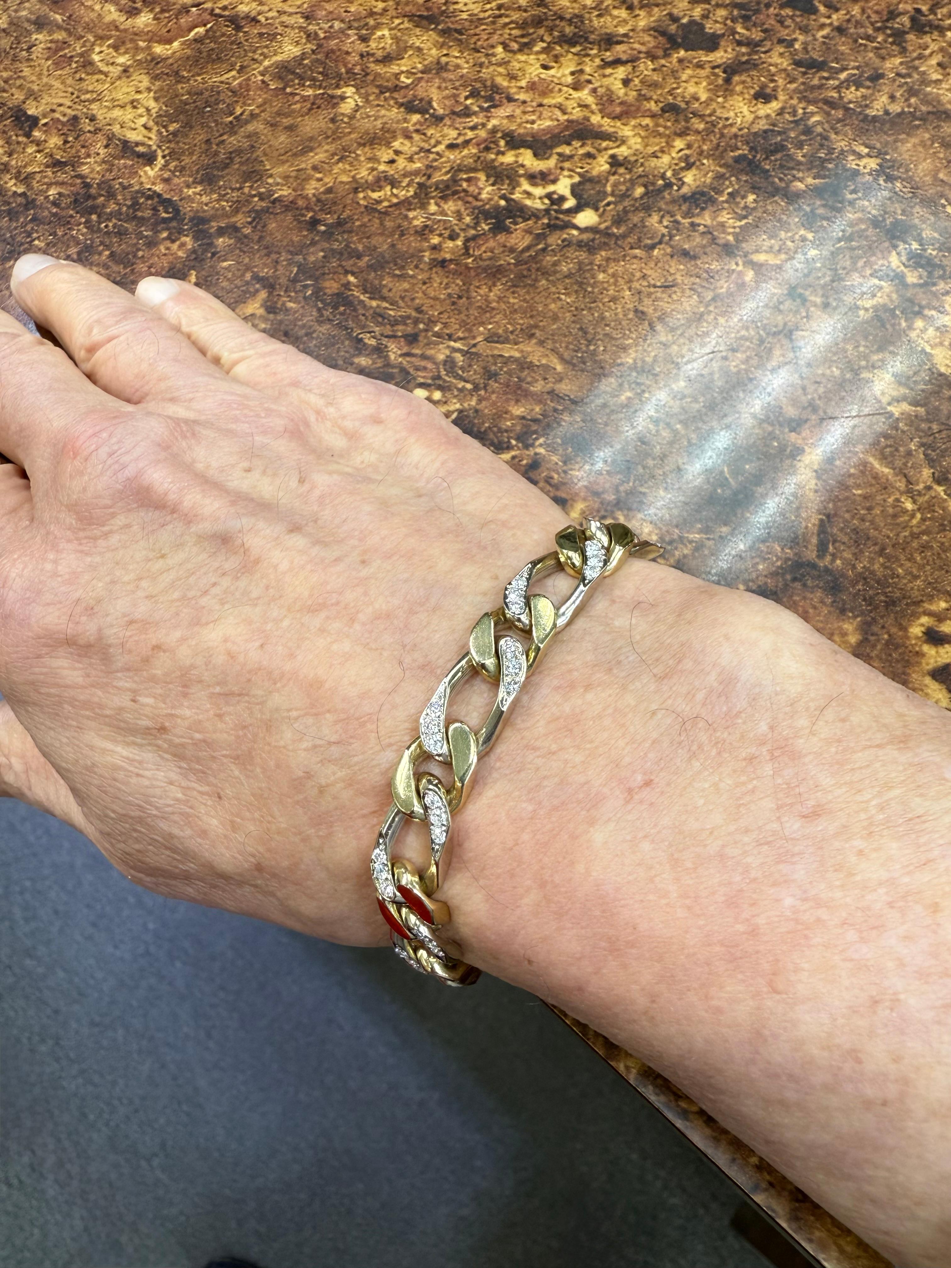  Nicolis Cola 1980s Diamond 18k Two Tone Gold Link Bracelet.

The Nicolis Cola Diamond and 18k two-tone gold link bracelet was made in the 1980s.  Longer 18k white gold diamond links alternate between 18k yellow gold shorter links.  This harmonious