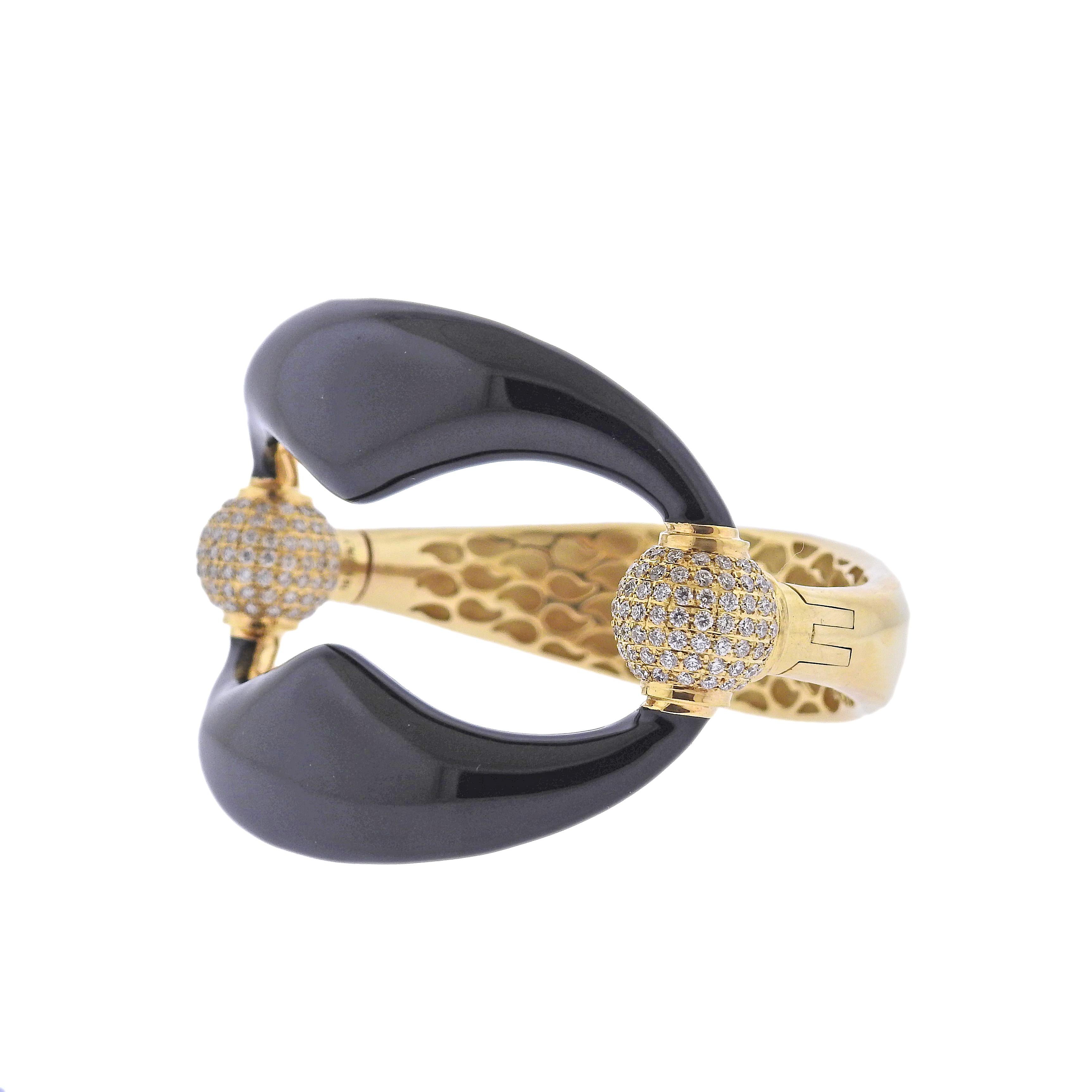 18k rose gold bangle bracelet by Italian designer Nicolis Cola, set with black enamel and approx. 3.15ctw in G/VS diamonds. Bracelet will fit approx. 7