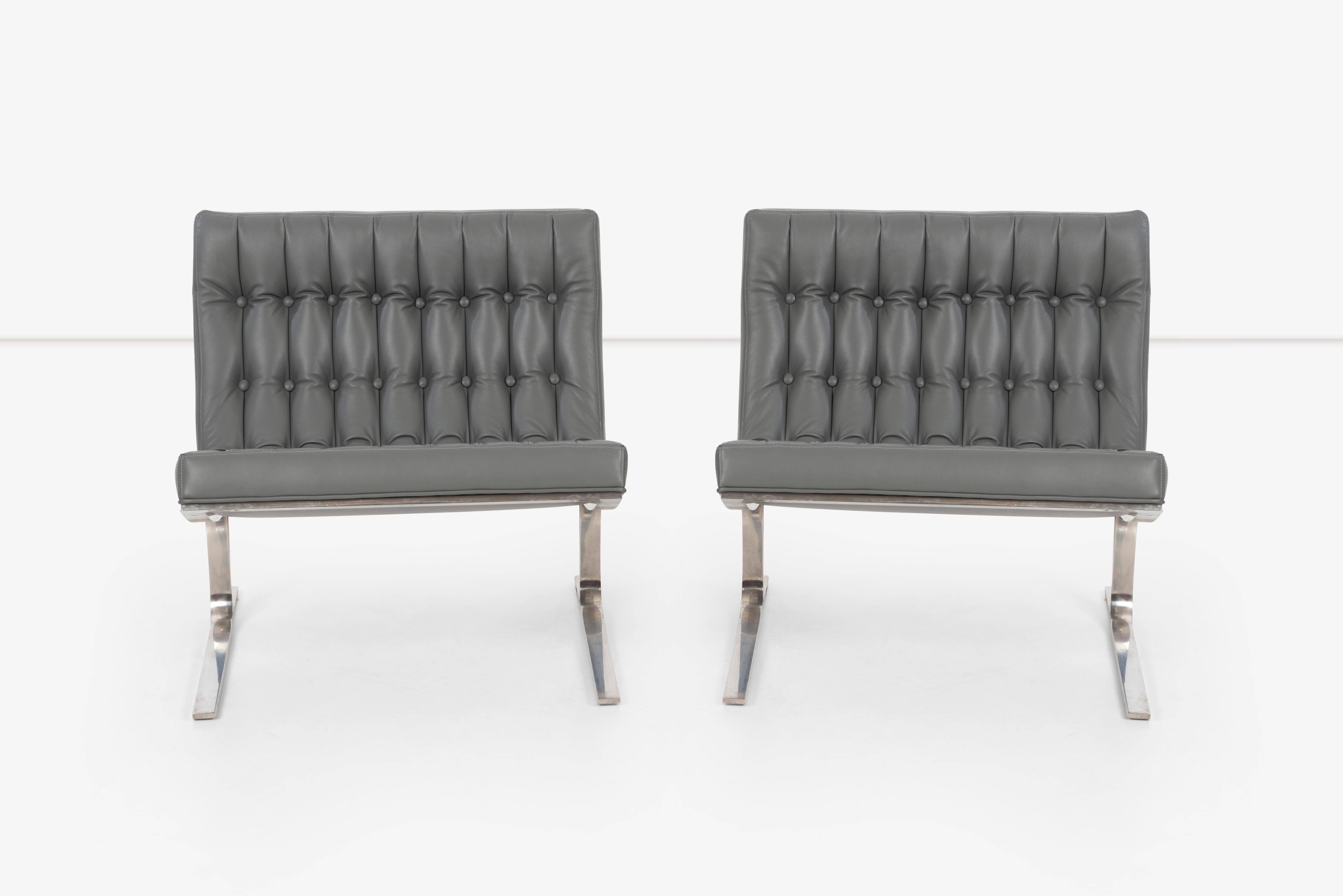 Nicos Zographos 1959 CH28 Lounge chairs; Solid cantilevered stainless steel frame, reupholstered, tufted and channeled with Spinneybeck leather.
Measure: Seat height 17