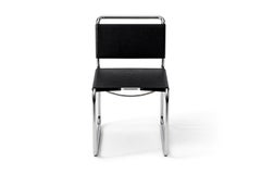 Silla Bauhaus «Nicos Zographos CH66» de metal y cuero, diseñada por Karakter para Cassina
