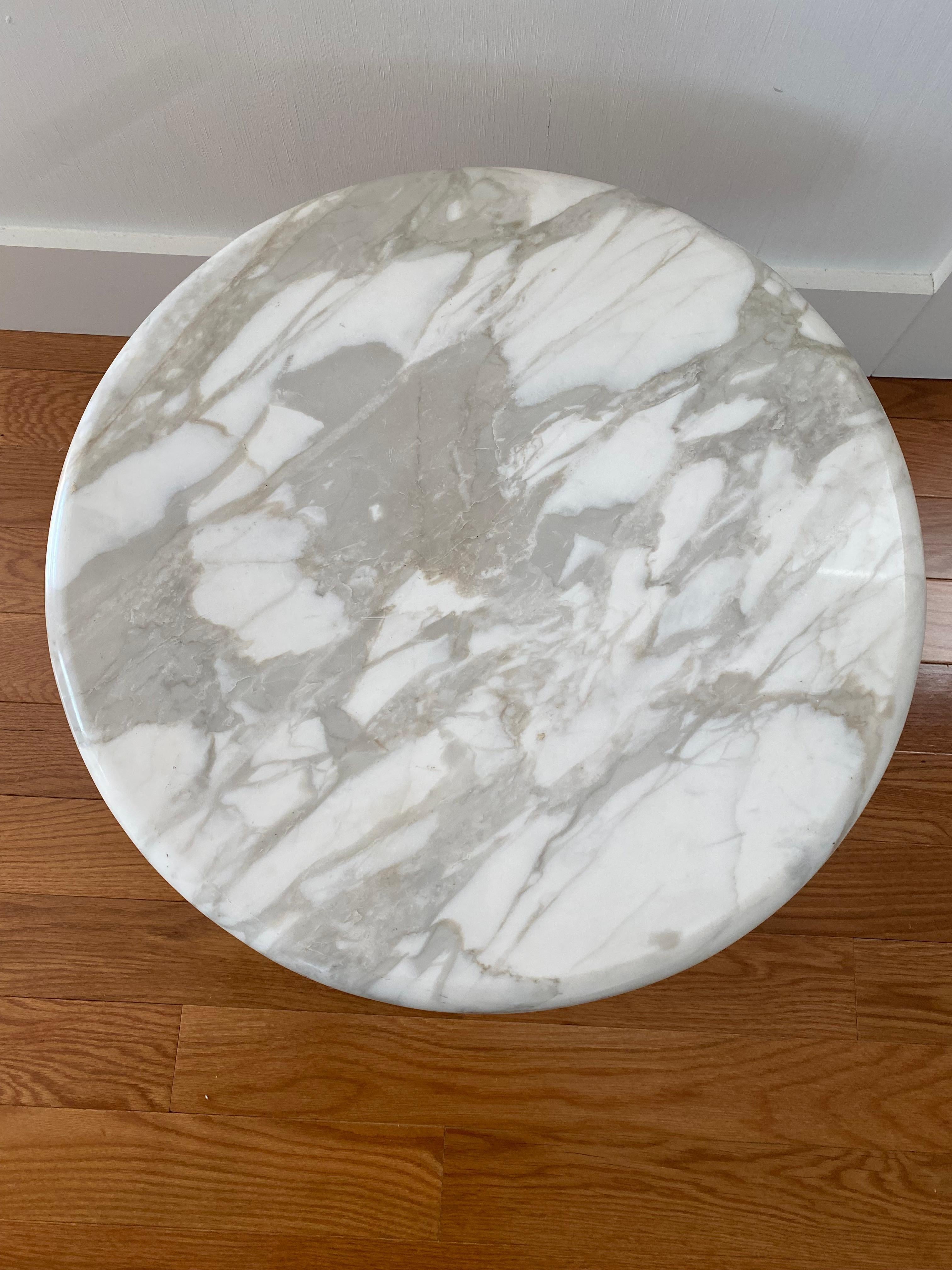 Unusual Zographos side or coffee table of carrara marble and stainless steel ALPHA cross base. Top quality piece and well crafted.

.