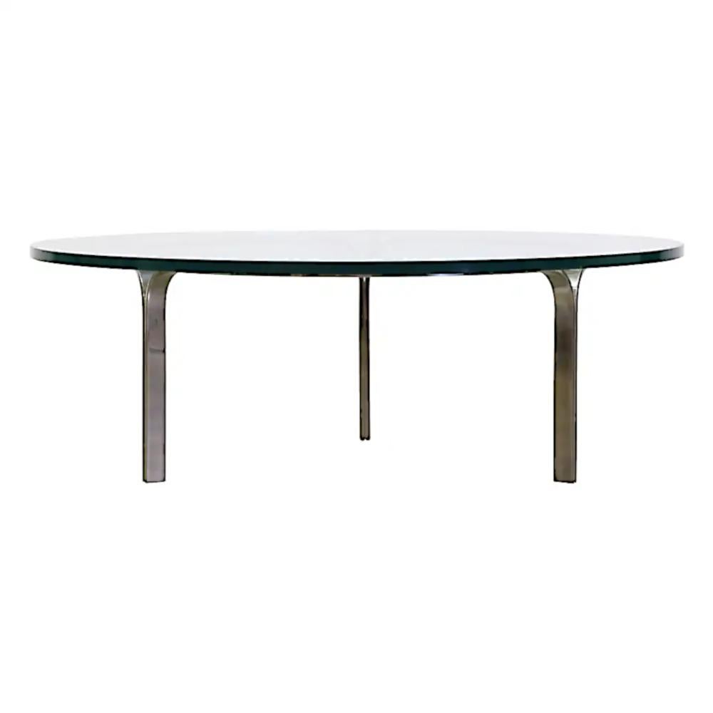 Polished steel and glass table by Nicos Zographos.