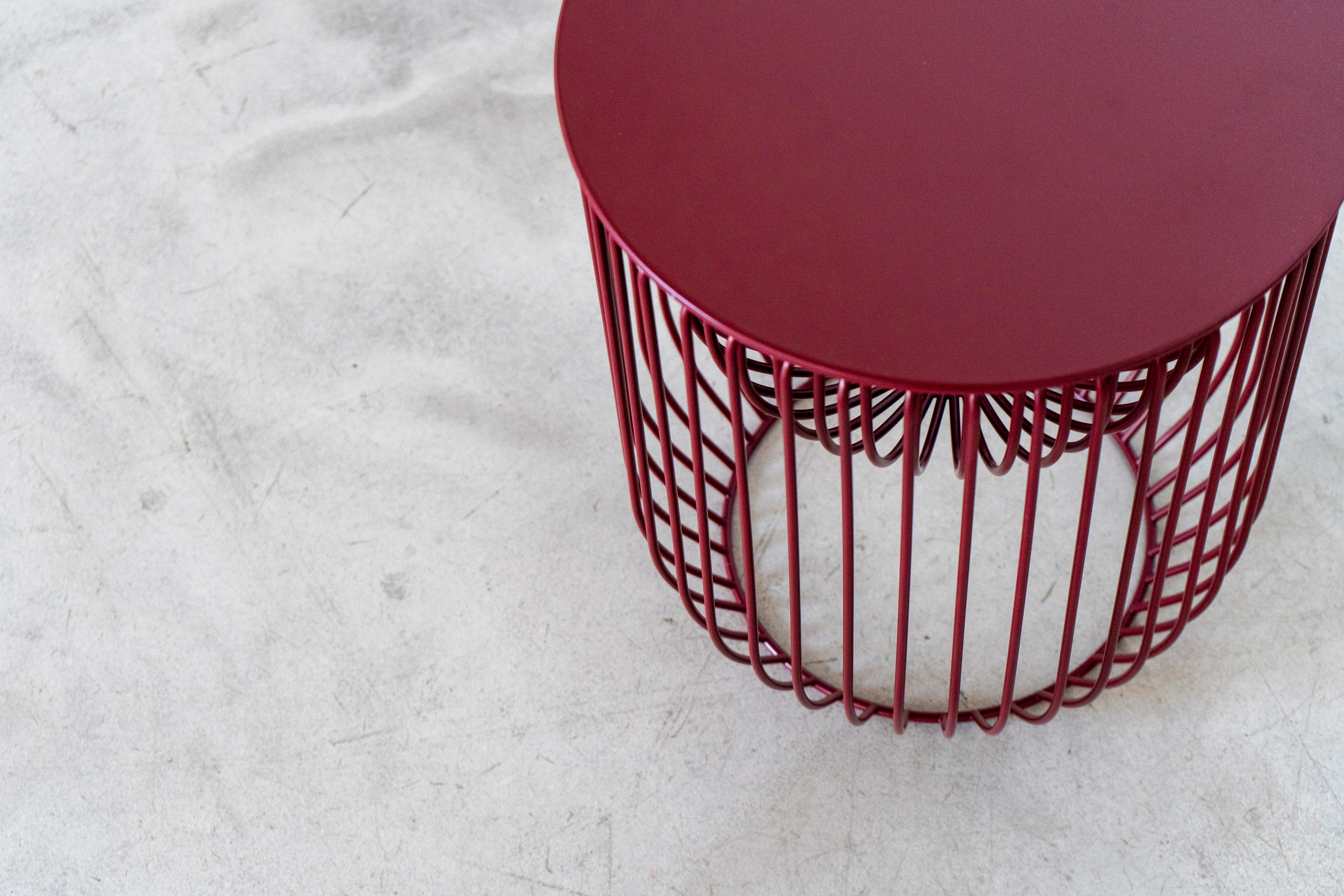 Nido is both a stool and a home for all the little things that matter. The elegant steel rod frame creates a basket for storing small items. The solid or soft seat is interchangeable, and comes in subtle color tones and fabrics.

Nido comes with a