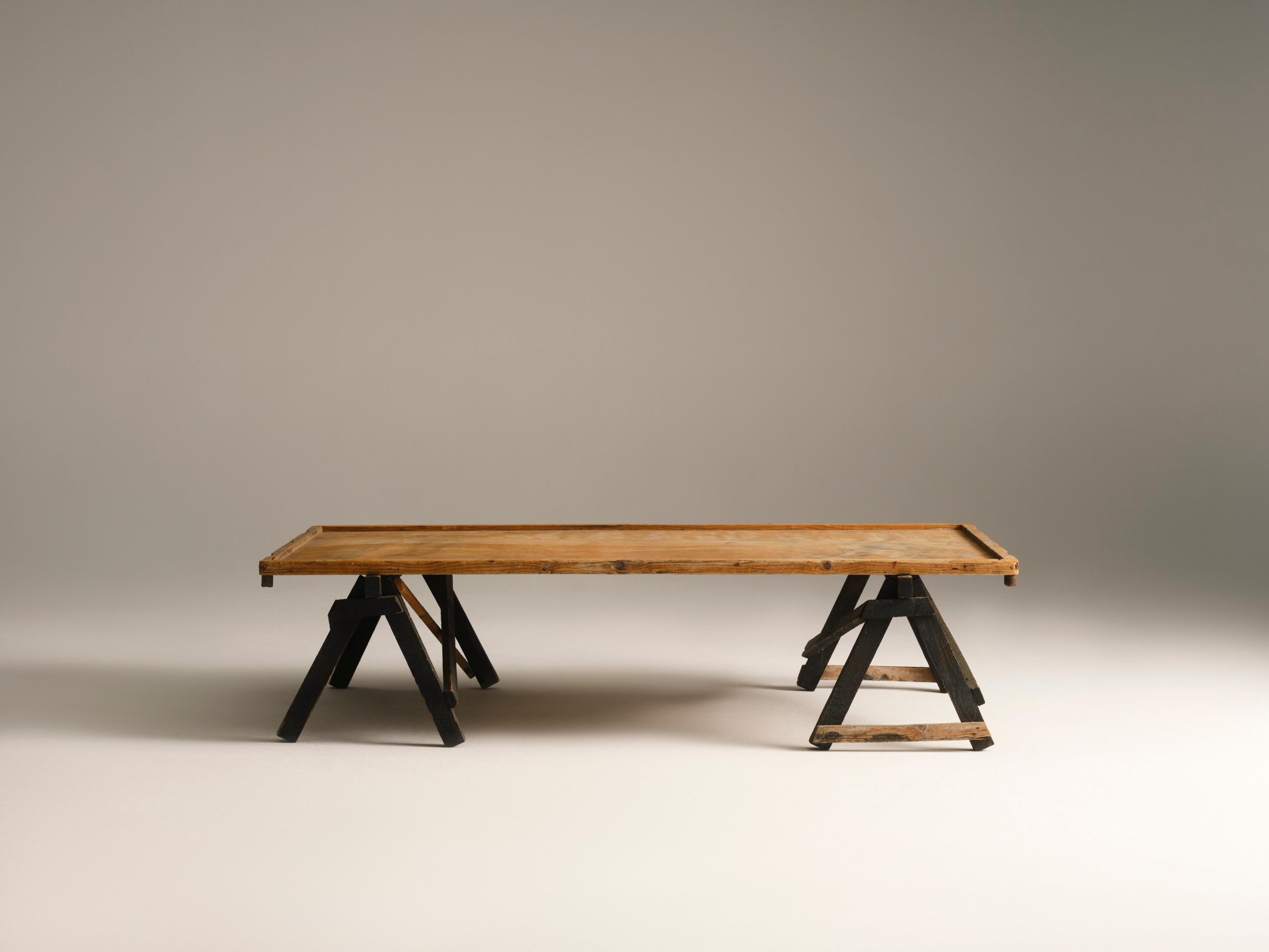 This sofa table saved from an old glass painting studio is the perfect conclusion to the collection. Formerly used in a glass mosaic workshop, these tables hold stories of the past and have been witness to the most beautiful glass painting creations