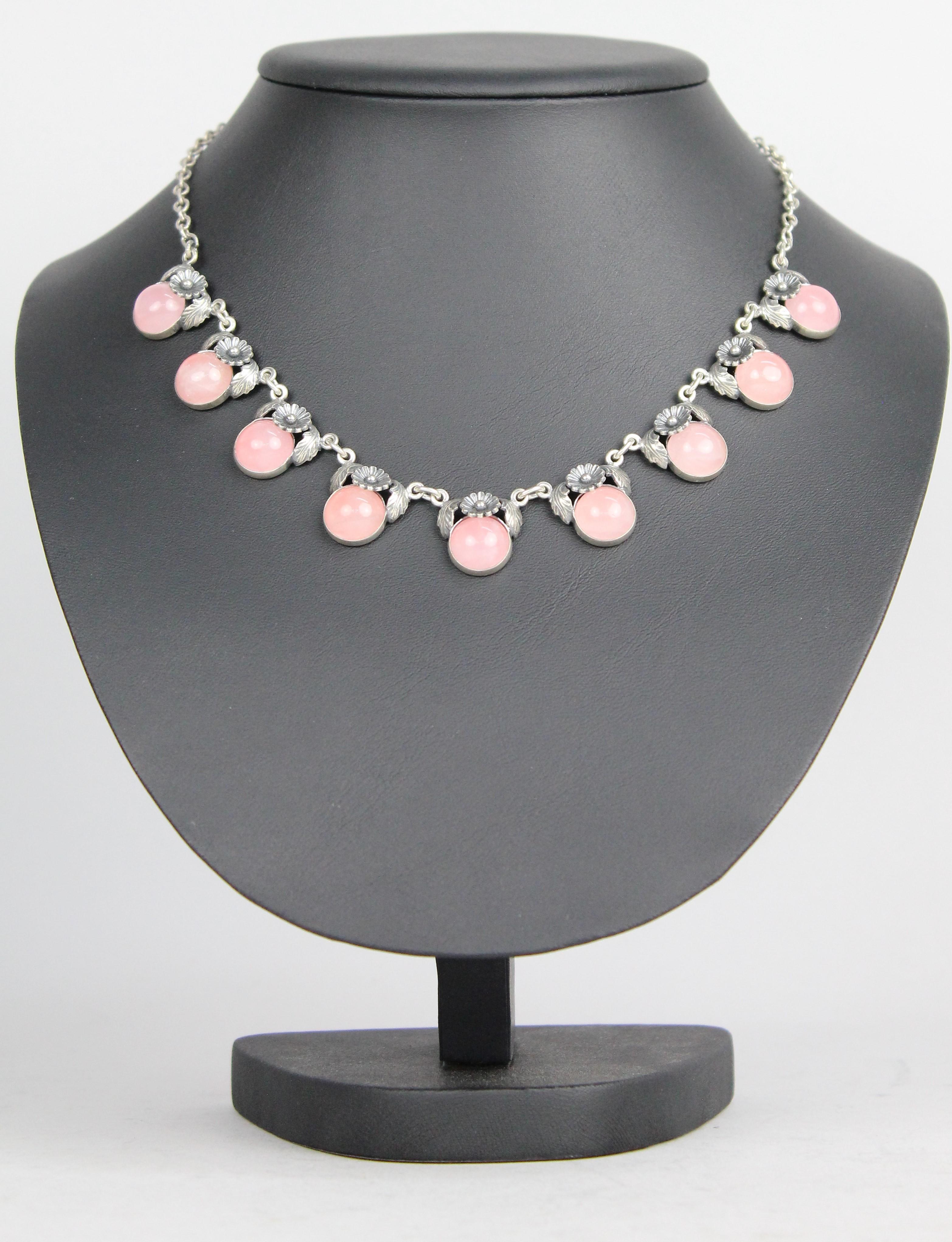 Niels Erik From, Scandinavian Modernist Necklace in Silver and Cabochon Cut Rose Quartz.

Very nice necklace in sterling silver by Danish jewelry designer N E From.
Nice vintage condition.

NIELS ERIK FROM
The Danish silversmith Niels Erik From