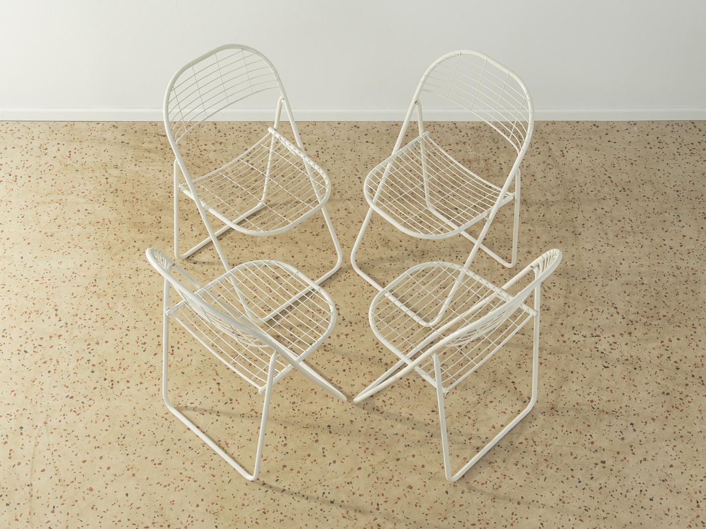 Åland metal folding chairs by Niels Gammelgaard for Ikea from the 1970s in white. The offer includes 4 chairs.

Quality Features:
 good workmanship
 high-quality materials
 Made in Sweden. Design: Niels Gammelgaard, manufacturer: Ikea.