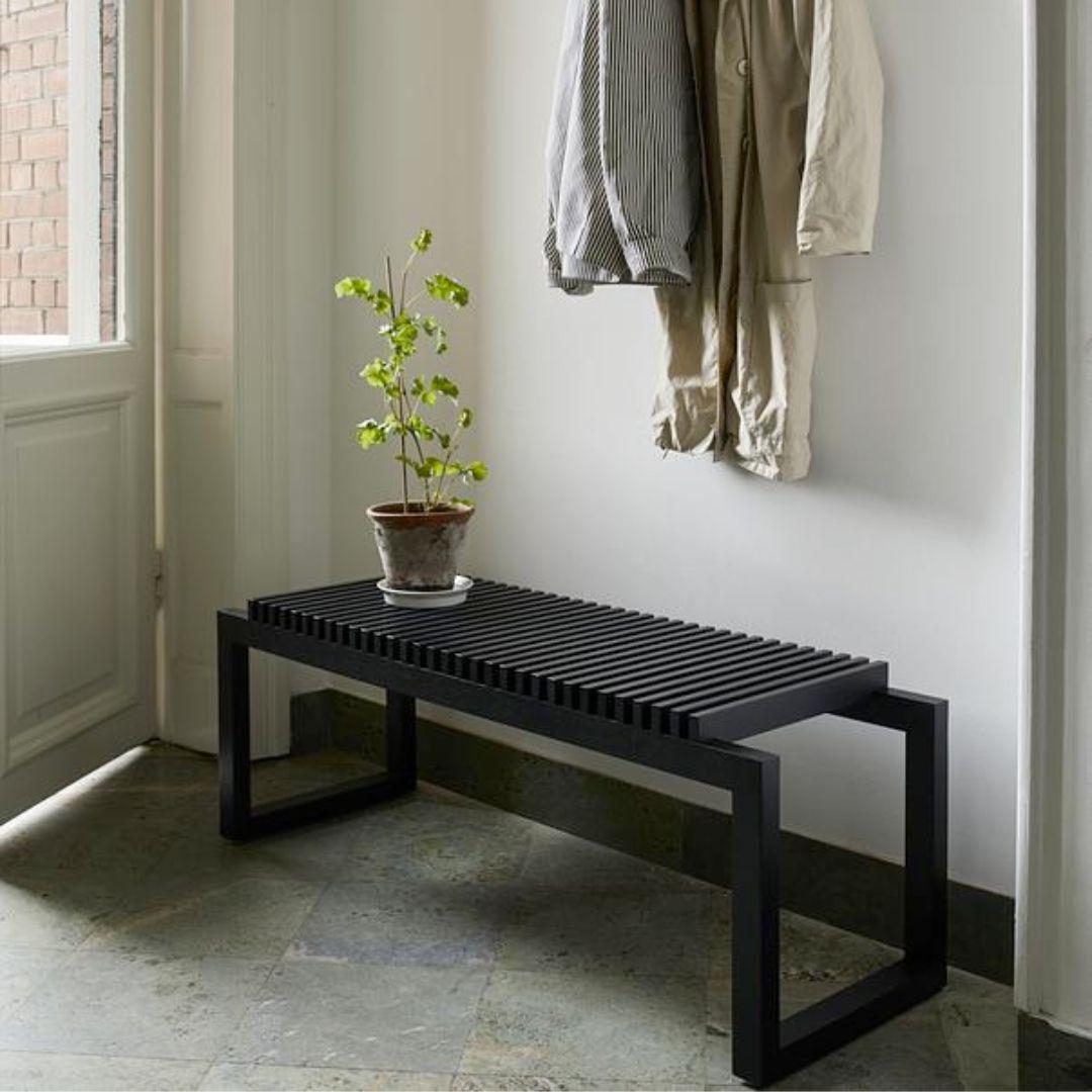 Niels Hvass outdoor 'Cutter' bench in black stained oak for Skagerak

Skagerak was founded in 1976 by Jesper and Vibeke Panduro, who took inspiration from their love of Scandinavian design and its rich tradition. The brand emphasizes