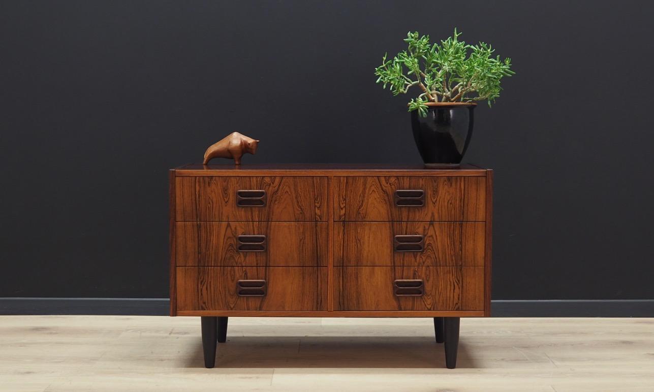 Fantastic chest of drawers from the 1960s-1970s. Scandinavian design, Minimalist form. Designed by Niels J. Thorsø. The surface of the furniture covered with rosewood veneer. The chest has six drawers. Maintained in good condition (minor bruises and