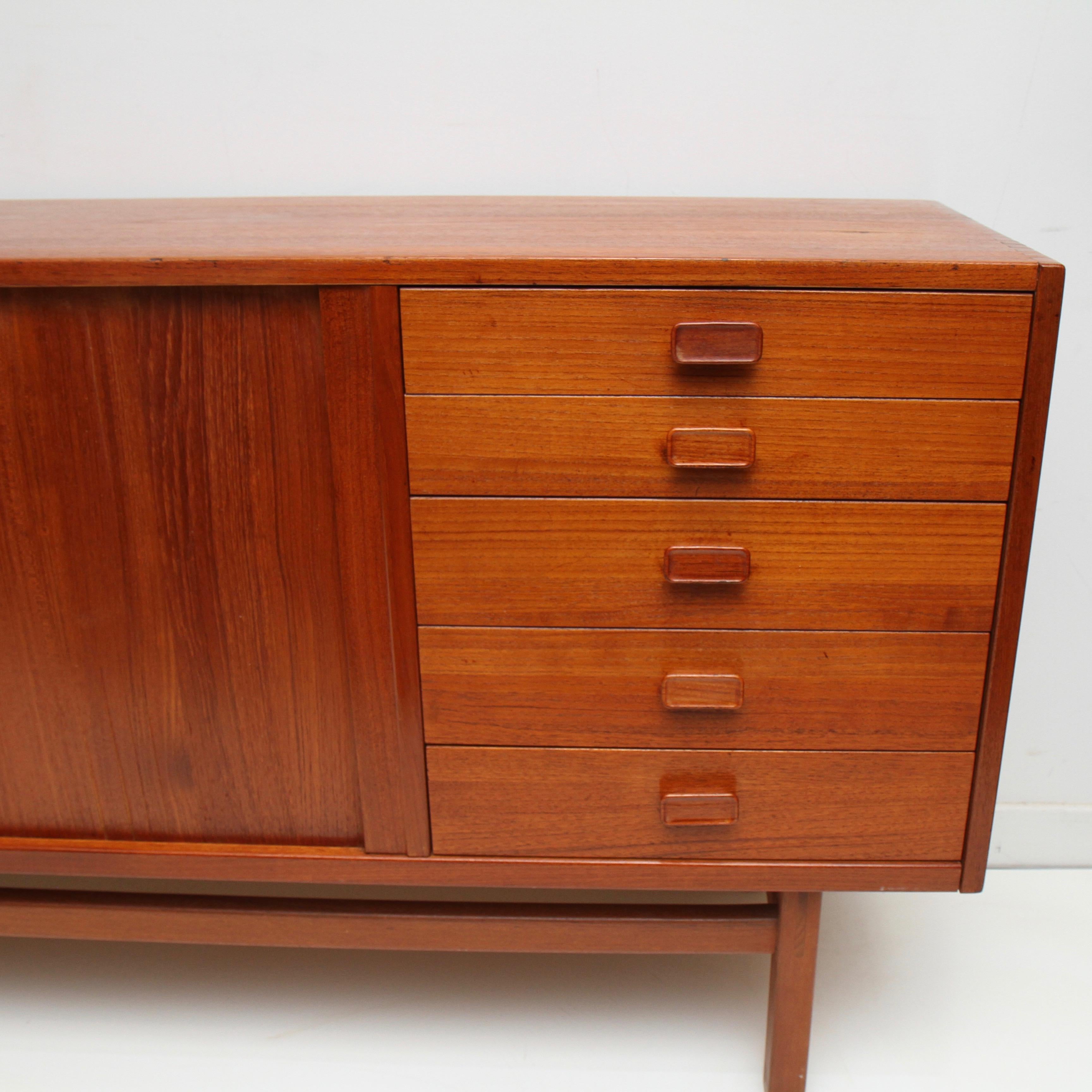 Clean Server sideboard fresh from its first gig of 50 years and ready for its second 50. 

Troeds is a well known Swedish producer famous for their vintage design pieces. In 1934 Svea Och Hugo Troedsson (also known as Troeds) started the furniture