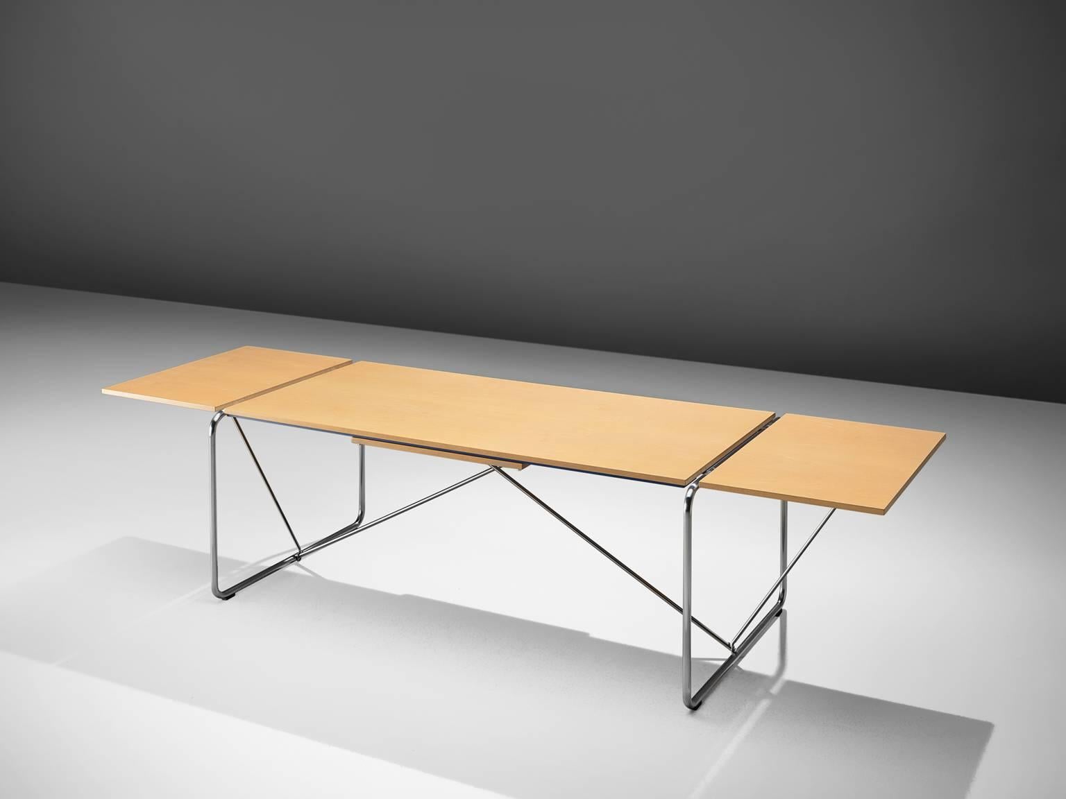 Niels Jørgen for Fritz Hansen, 'Haugesen' table in chrome and maple, Denmark, design 1986, production 1988.

This extendable table is designed by Niels Jørgen for Fritz Hansen. The table is in good condition and is a good example of strict,