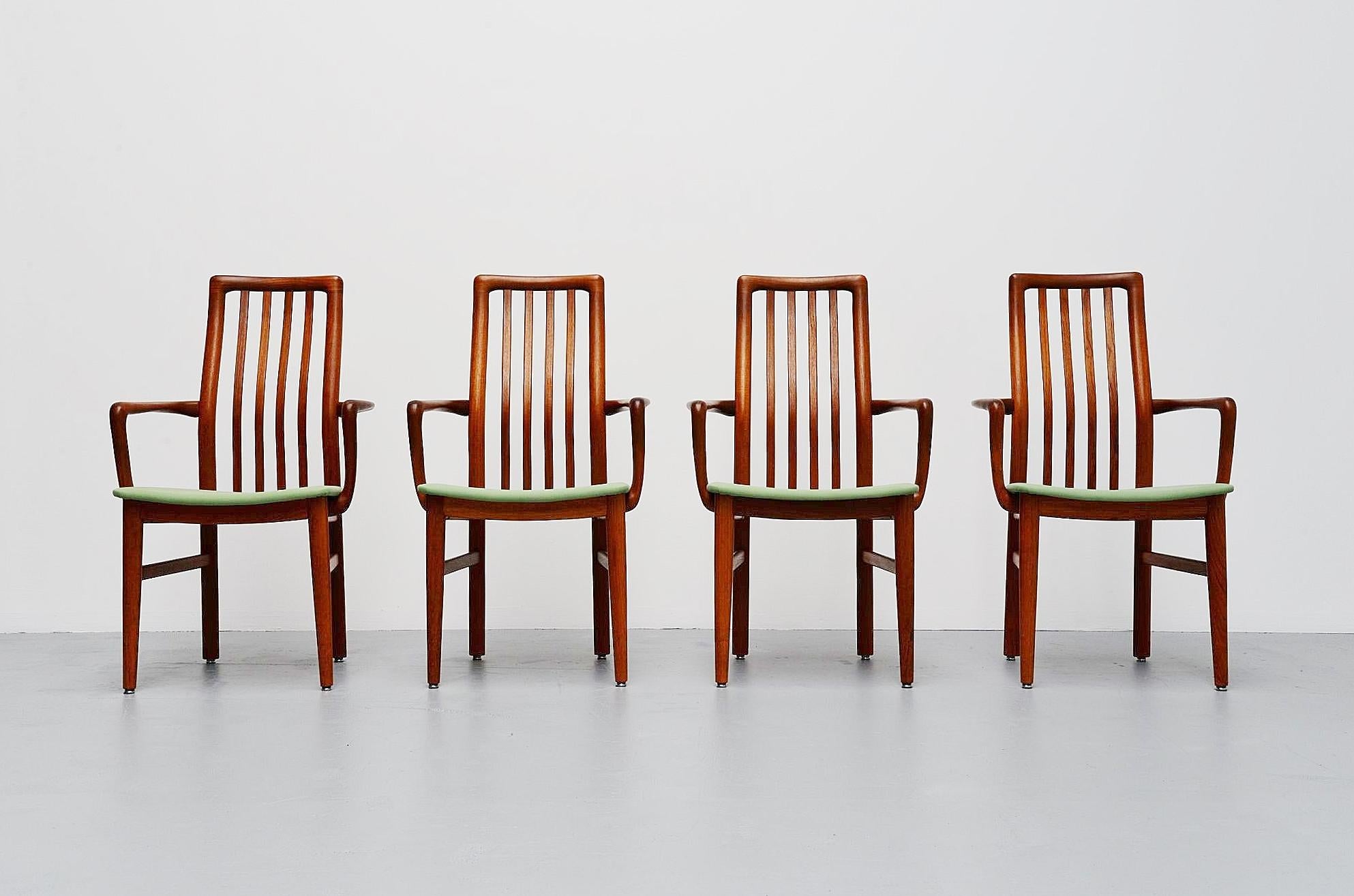 Very nice set of 4 armchairs designed by Niels Koefoed, manufactured by Hornslet Mobelfabrik, Denmark 1960. The chairs are made of solid teak wood and they are newly upholstered in mint green fabric. The arms have very nice dovetail connections at
