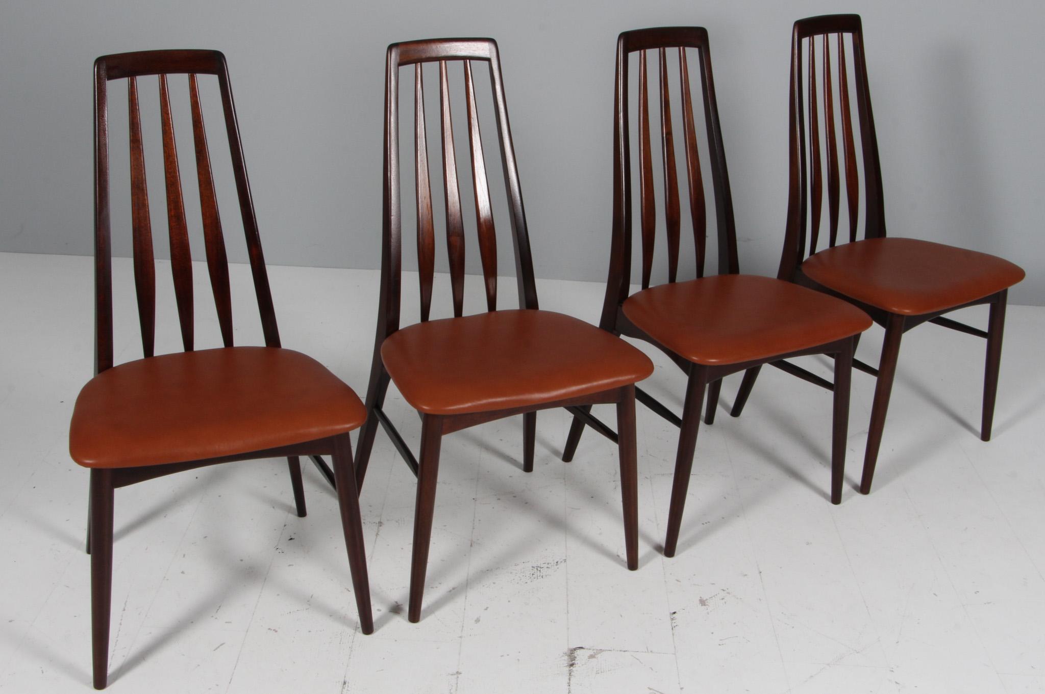 Niels Koefoed dining chairs made in solid mahogany.

New upholstered in full grain cognac pure aniline leather.

Model Eva, made by Niels Koefoeds Møbelfabrik Hornslet, 1960s.

