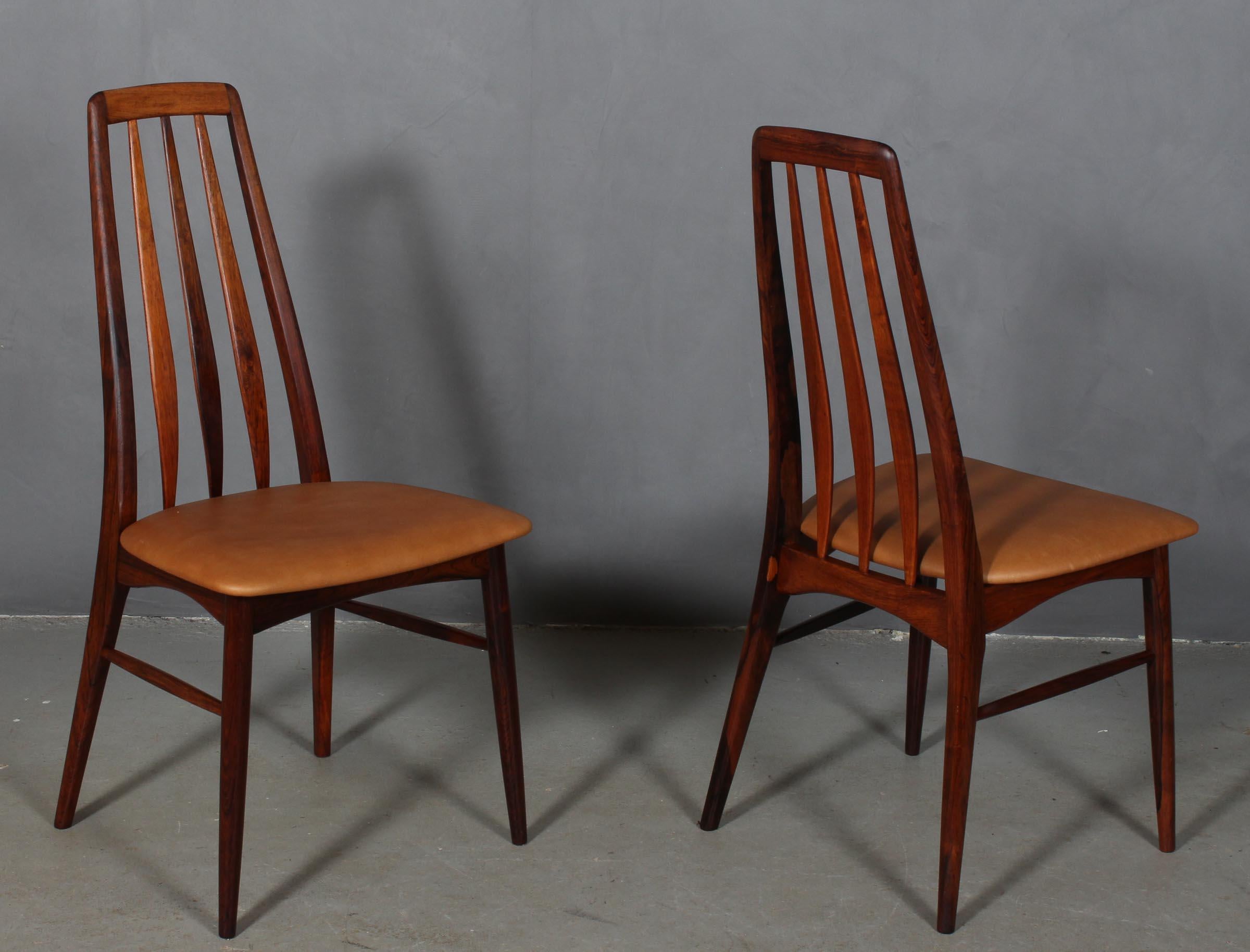 Niels Koefoed dining chairs made in solid rosewood.

New upholstered in tan vintage aniline leather.

Model Eva, made by Niels Koefoeds Møbelfabrik Hornslet, 1960s.

 