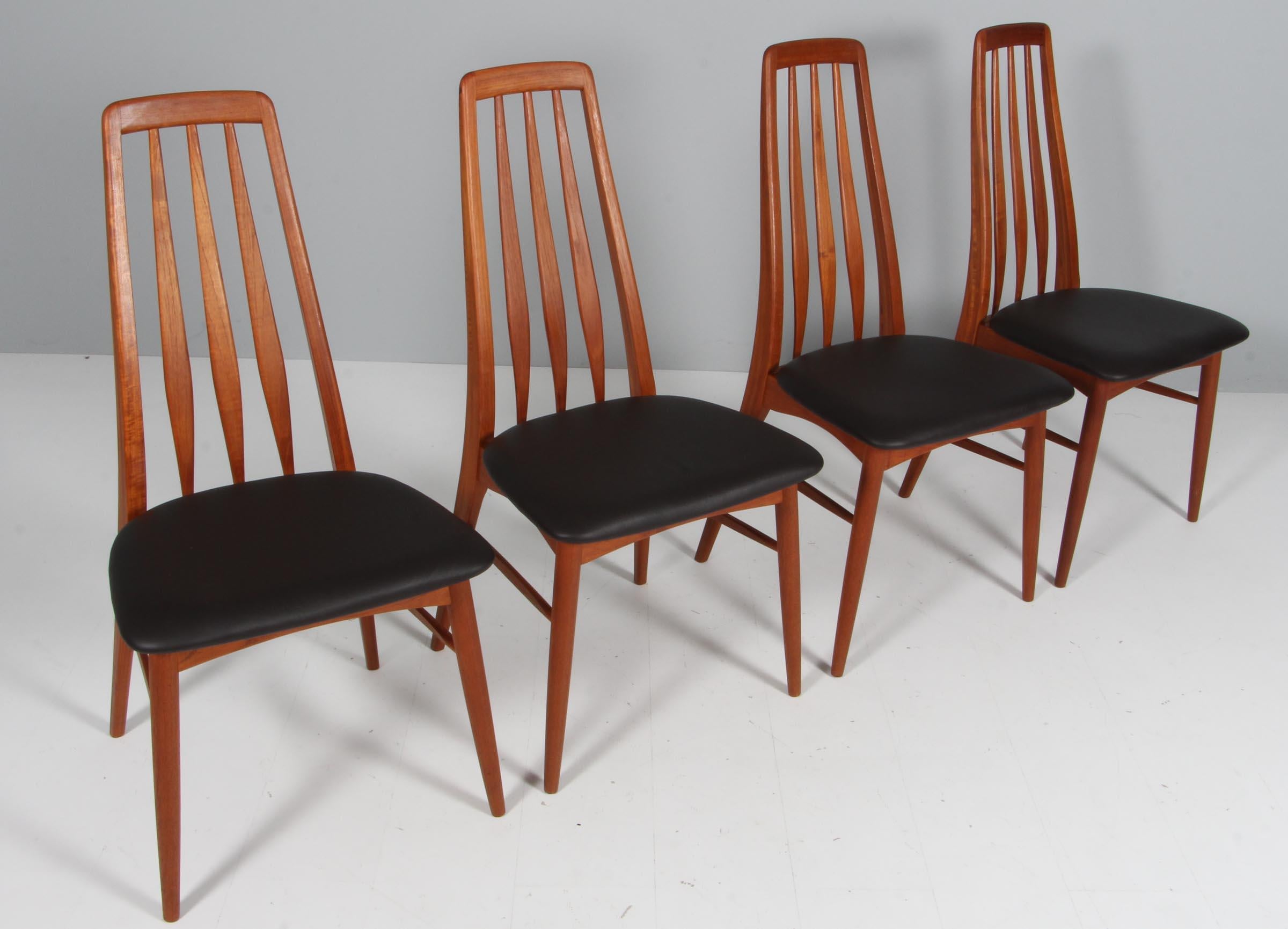 Niels Koefoed dining chairs made in solid teak.

New upholstered in dark brown Savanne leather from Arne Sørensen.

Model Eva, made by Niels Koefoeds Møbelfabrik Hornslet, 1960s.

