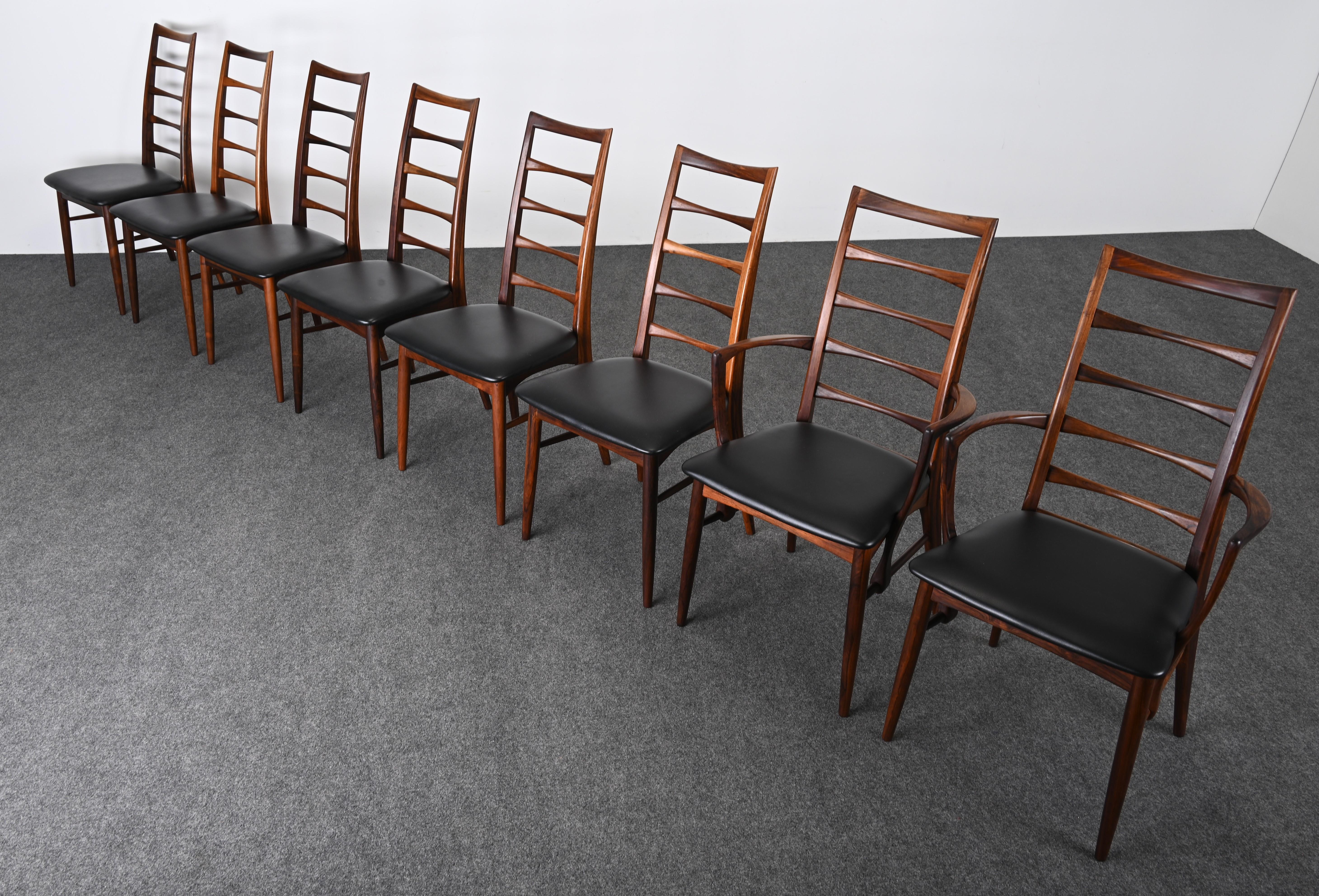 A gorgeous set of eight Koefoeds Hornslet rosewood dining chairs designed by Niels Koefoed, 1960s. This set has six side chairs and two armchairs. The chairs are structurally sound and in very good condition. The six side chairs and pair of