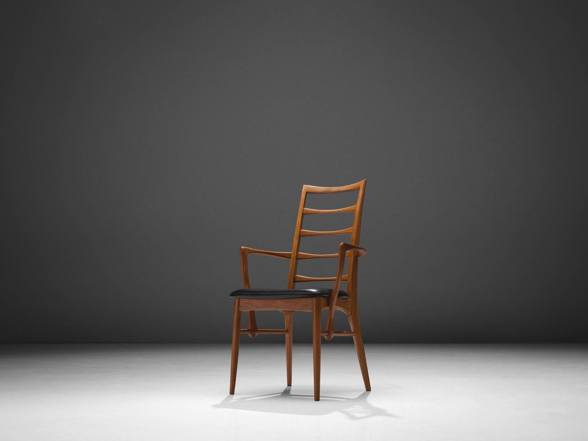 Niels Koefoed for Koefoeds Møbelfabrik, dining chair, teak, black leather, Denmark, circa 1968.

This side chair is designed by Niels Koefoed for Koefoeds Møbelfabrik. These chairs main feature is their high back with horizontal solid teak slats.