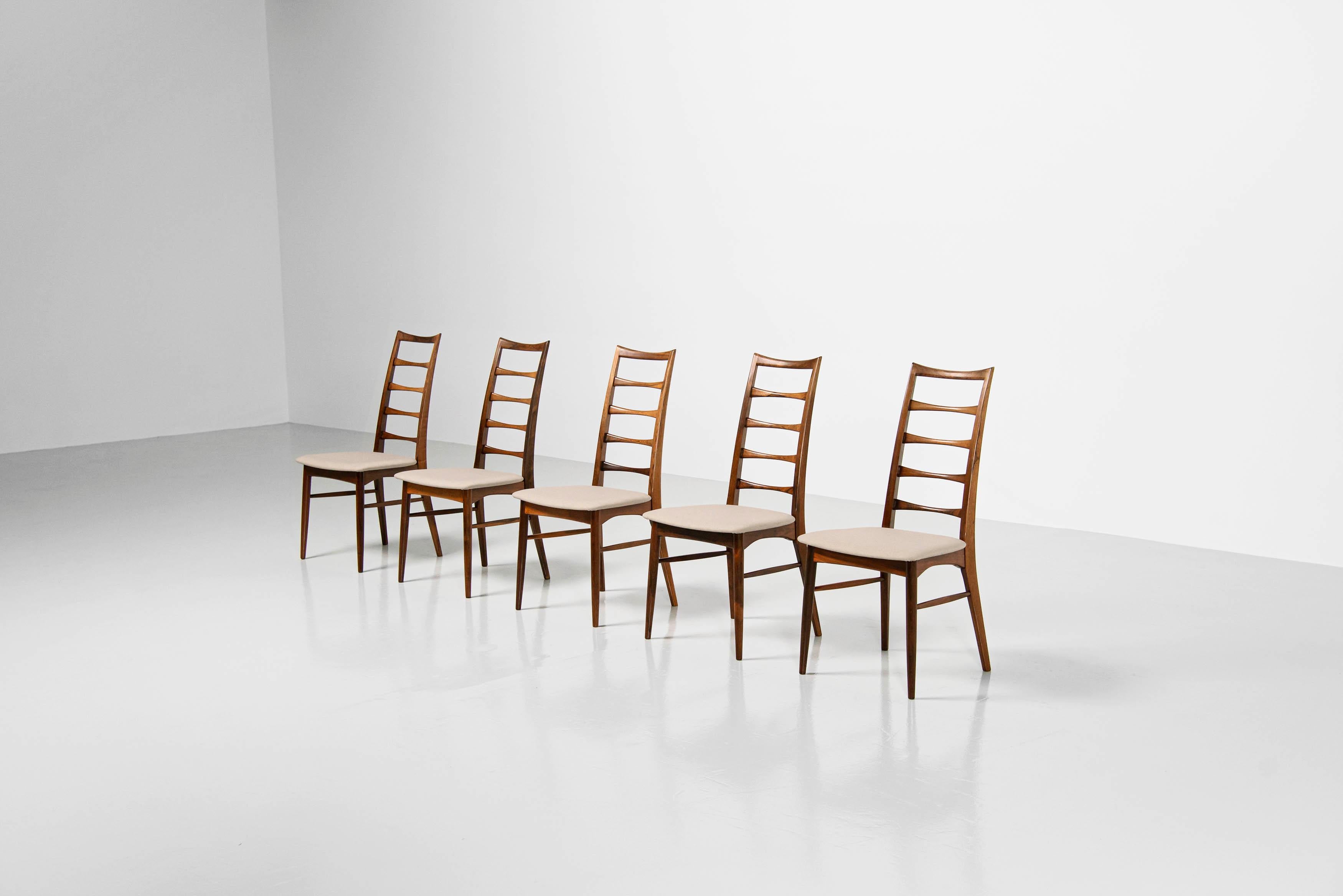Beautiful sculptural set of 5 high back dining chairs model Lis, Designed by Niels Koefoed and manufactured by Koefoeds Møbelfabrik A/S, Denmark 1961. These chairs are made of solid rosewood with amazing grain to the wood and they have been