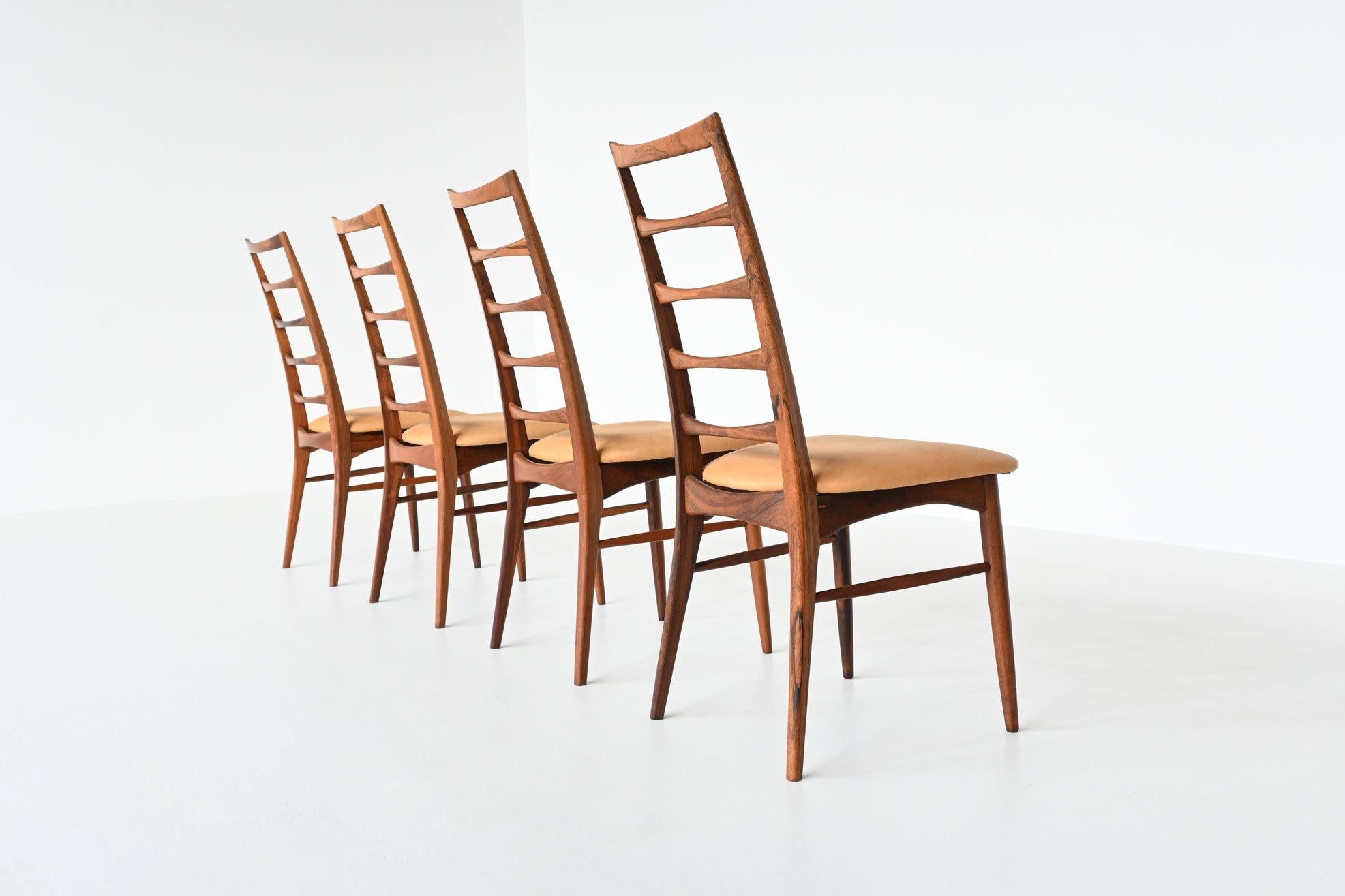 Beautiful shaped set of four dining chairs designed by Niels Koefoed and manufactured by Koefoeds Mobelfabrik A/S, Denmark 1961. These chairs are made of amazing grained solid rosewood and are reupholstered with an high quality natural camel colored