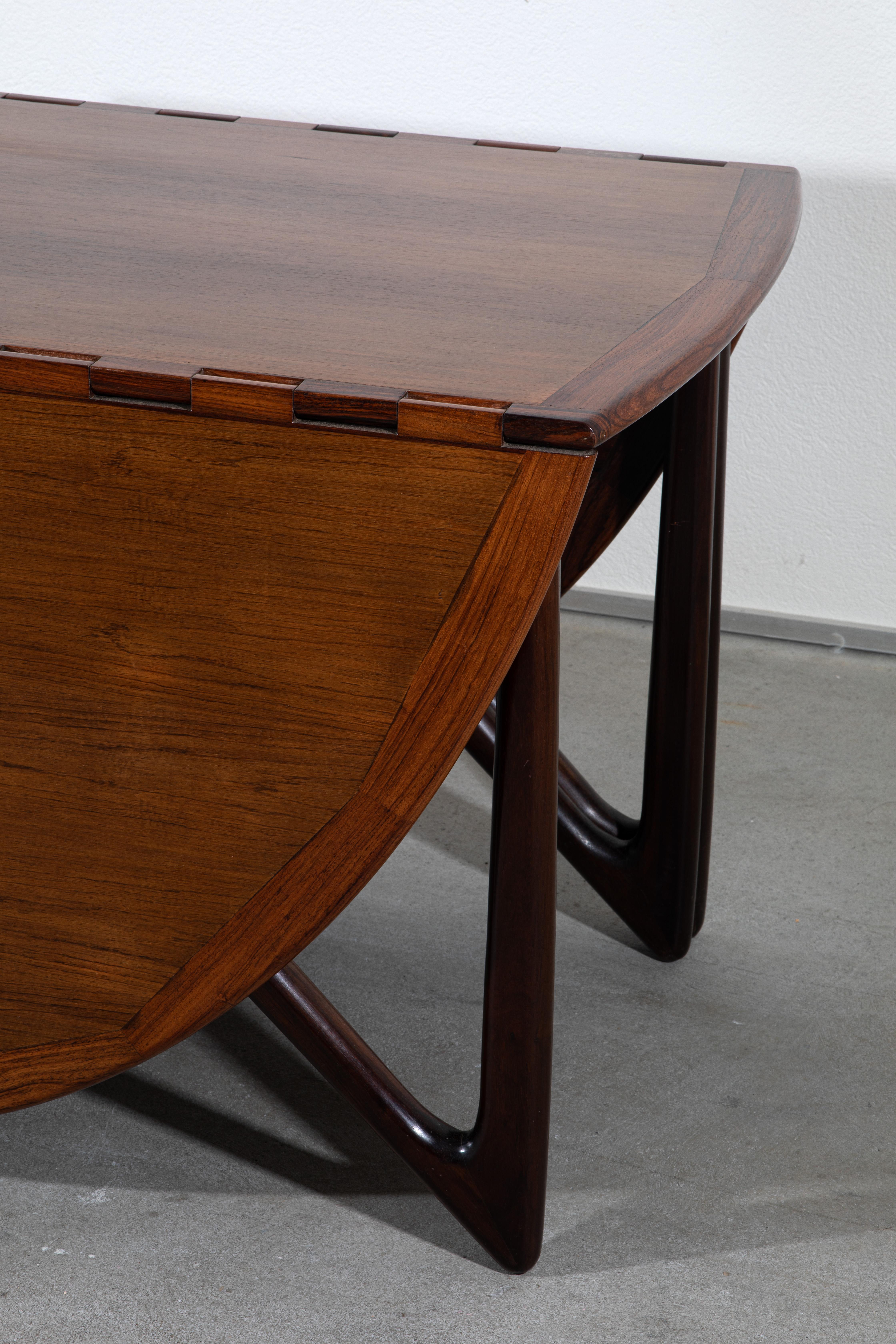 Niels Koefoed was a Danish furniture designer known for his contributions to mid-20th-century Danish modern design. The Oval-Klap dining table is likely one of his notable designs.