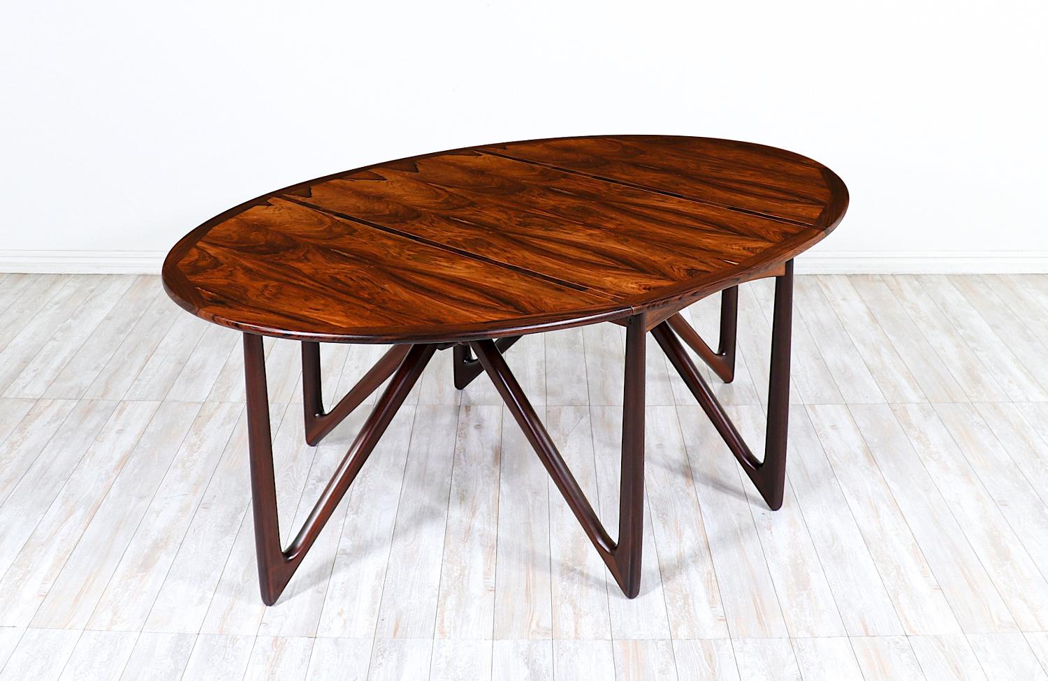 Danish Niels Koefoed Sculpted Rosewood Dining Table for Koefoeds Møbelfabrik