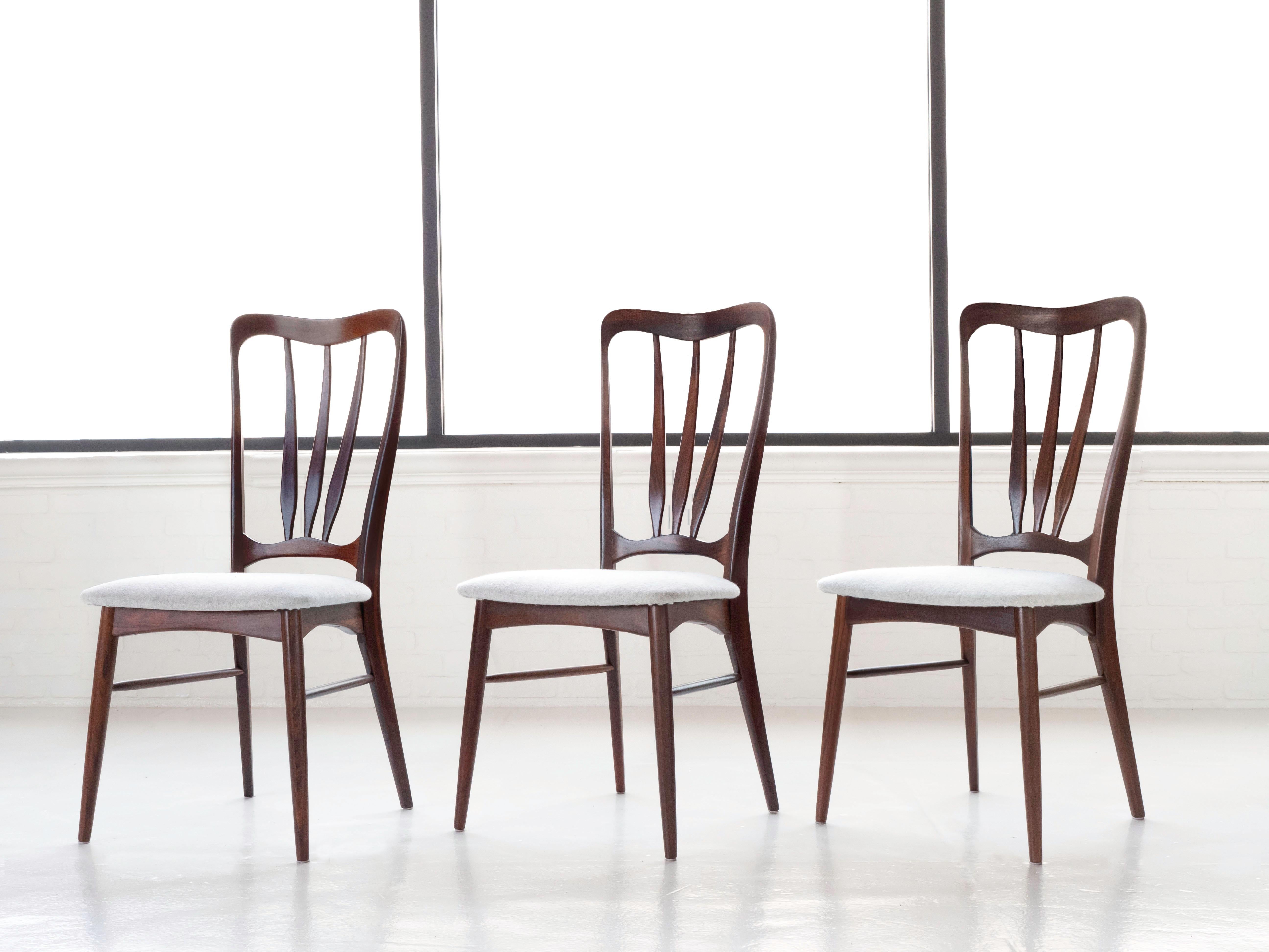 Set of 6 rosewood dining chairs by designer Niels Koefoed for his company Koefoed Hornslet. Made in Denmark circa 1960's. Each chair has been refinished and has new upholstery. All chairs are stamped underneath with the makers mark. Style name