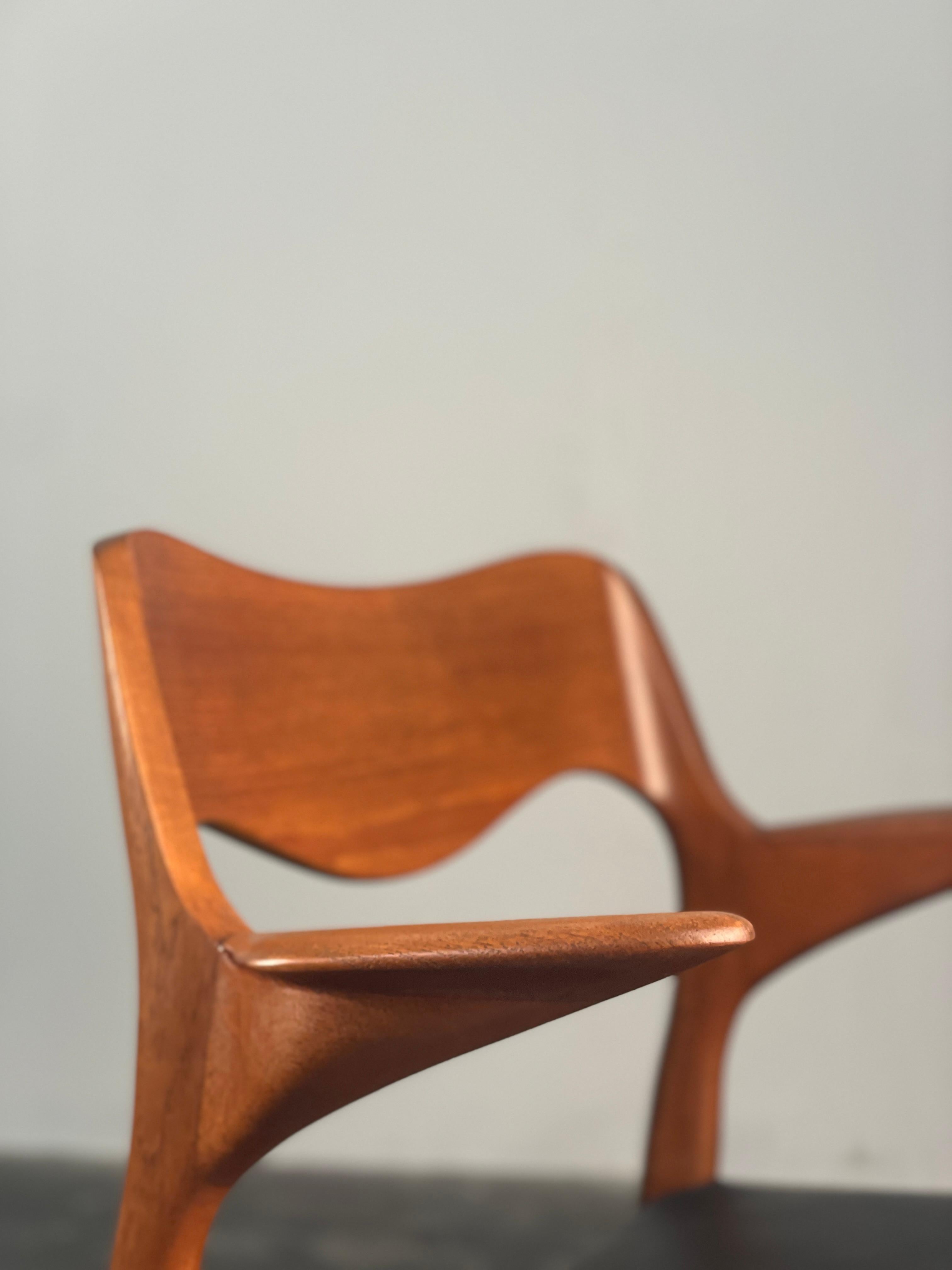 Danish Niels  Møller 55 arm chair in teak with new black leather seat
