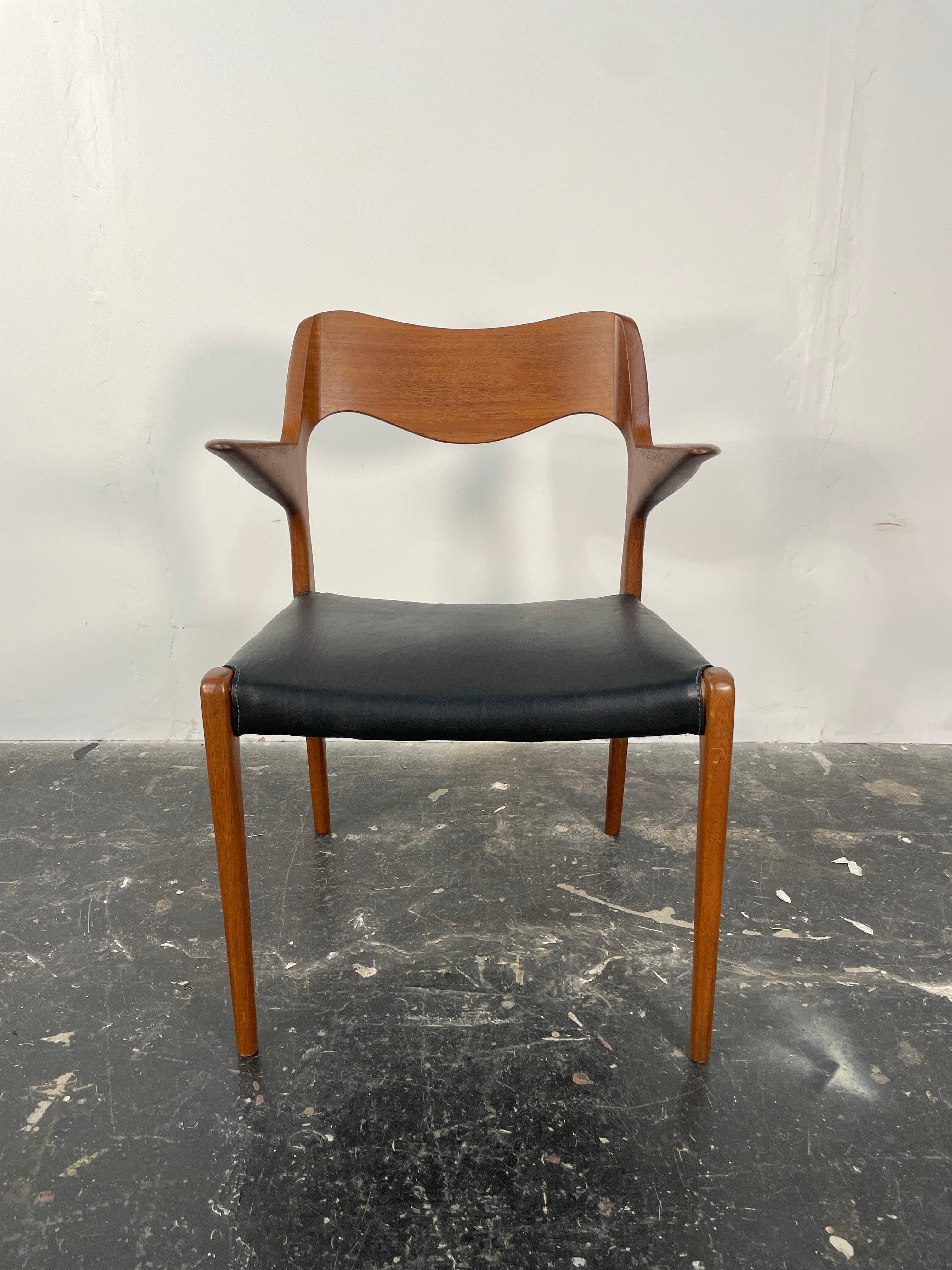 Mid-20th Century Niels  Møller 55 arm chair in teak with new black leather seat