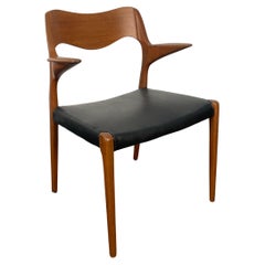 Niels  Møller 55 arm chair in teak with new black leather seat