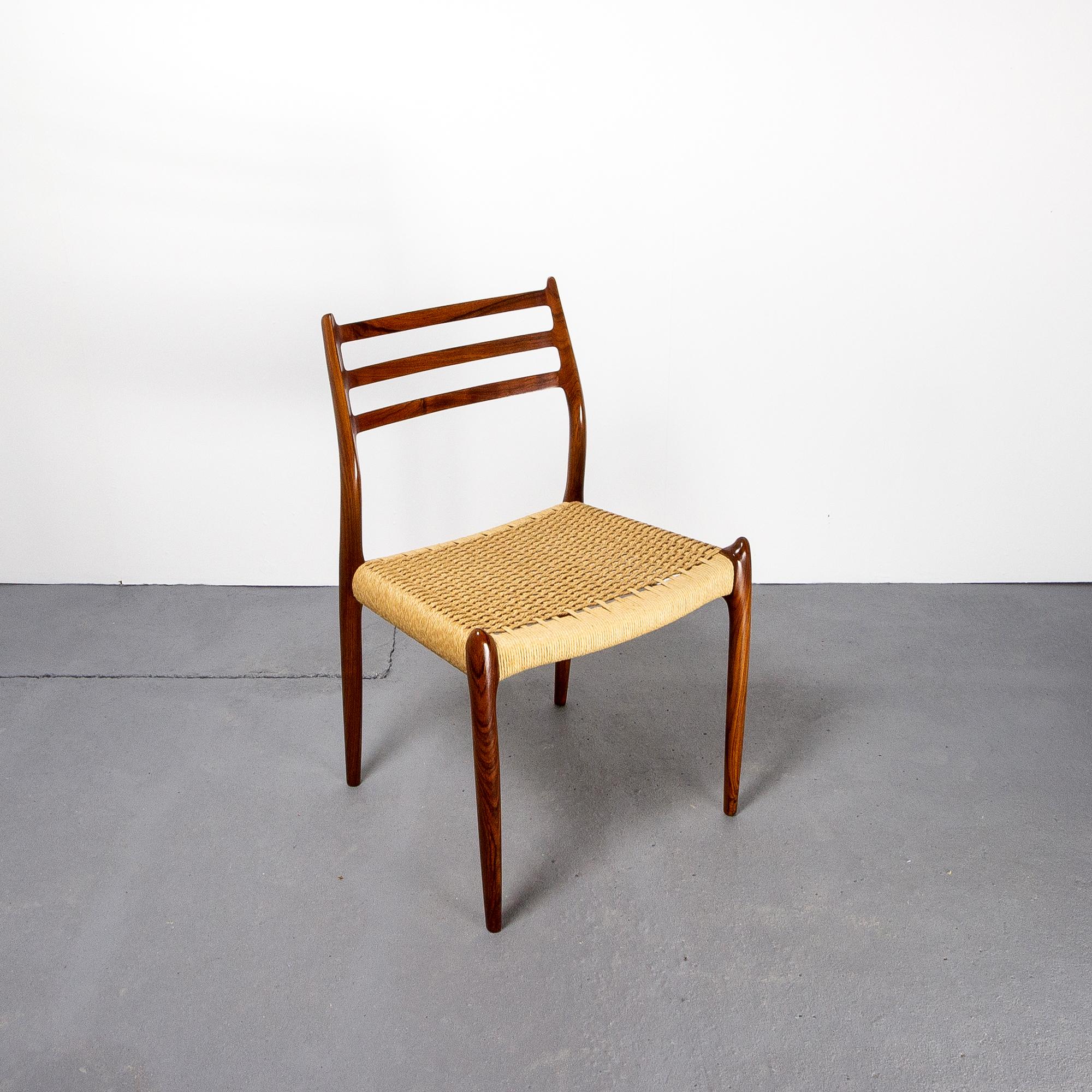 Set of six Model 78 rosewood dining chairs with Danish paper cord seats. Designed by N.O. Møller in 1954 for J.L. Moller Mobelfabrik, Denmark, 1960s. Both the frames and paper cord seats are in excellent condition. The paper cord seats have been