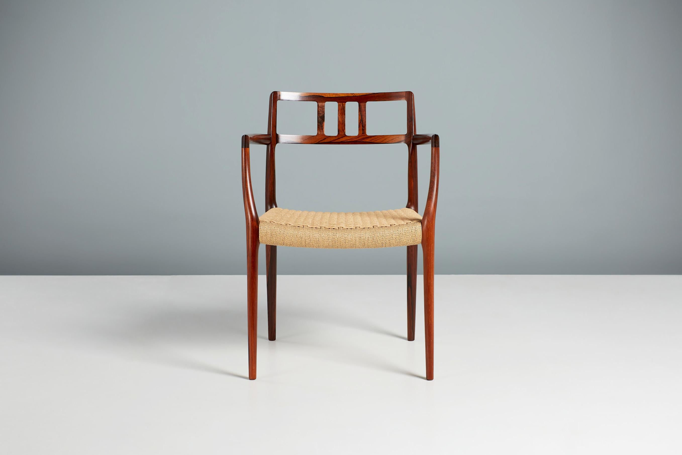 Niels Møller Model 64 armchair

A rarely seen rosewood example of Niels Moller's classic Model 64 armchair, designed in 1966 by Møller for his own company J.L. Møller Møbelfabrik in Denmark. The frame is made from highly-figured, solid rosewood