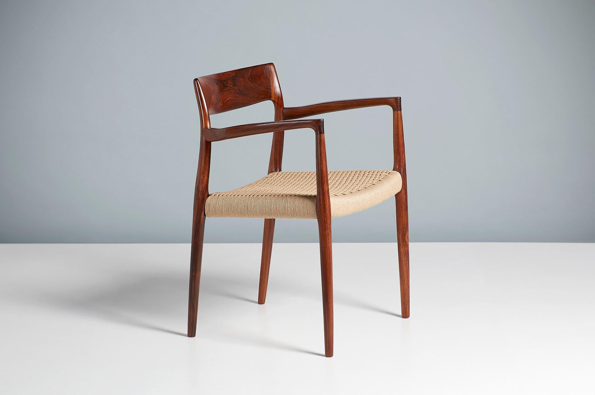 Niels O. Moller

Model 57 Carver chair, c1959

Iconic carver chair produced in stunning, highly figured rosewood by J.L. Moller Mobelfabrik, Denmark in c1959. The frame has been carefully cleaned and oil and the seat has a newly woven papercord