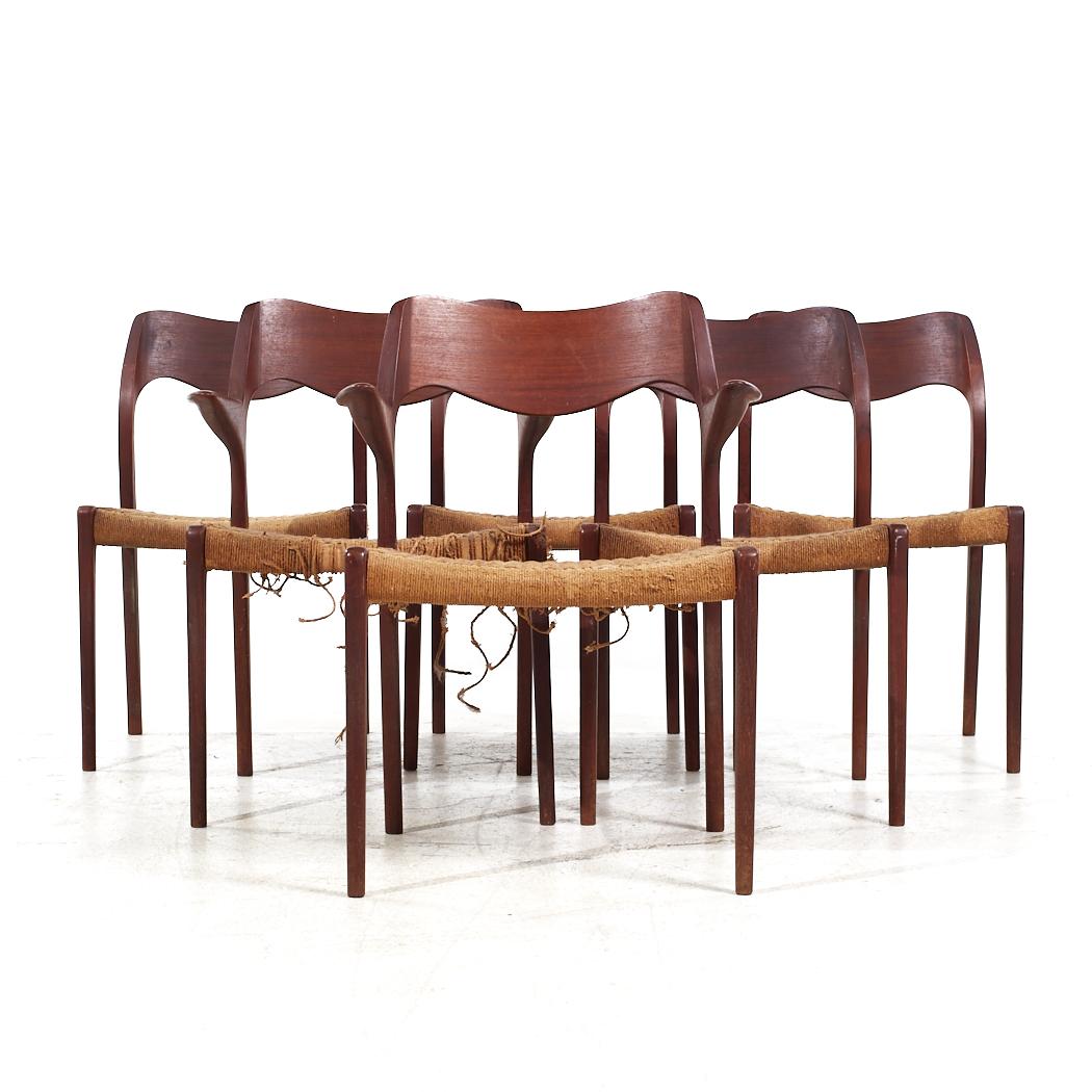 Niels Moller Danish Model 55 and Model 71 Mid Century Teak Dining Chairs - Set of 6

Each armless chair measures: 19.5 wide x 19.5 deep x 31.5 high, with a seat height of 17 inches
Each captains chair measures: 23.5 wide x 21 deep x 31.5 high, with