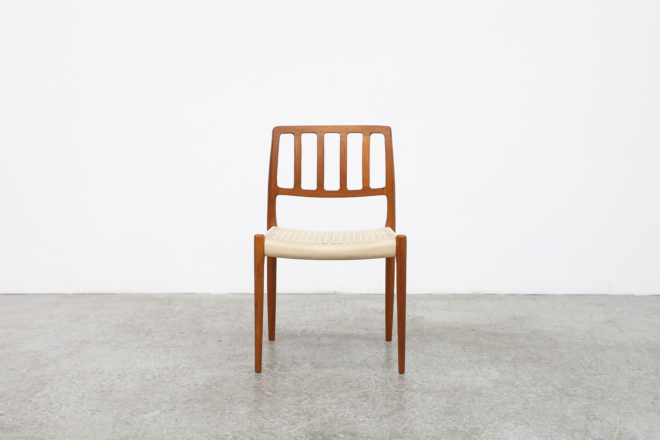 This 1970s Niels Moller Model 83 Chair has a teak frame and woven off white seat. In good original condition with wear consistent with it age and use. Other similar chairs available, listed separately. (S401)