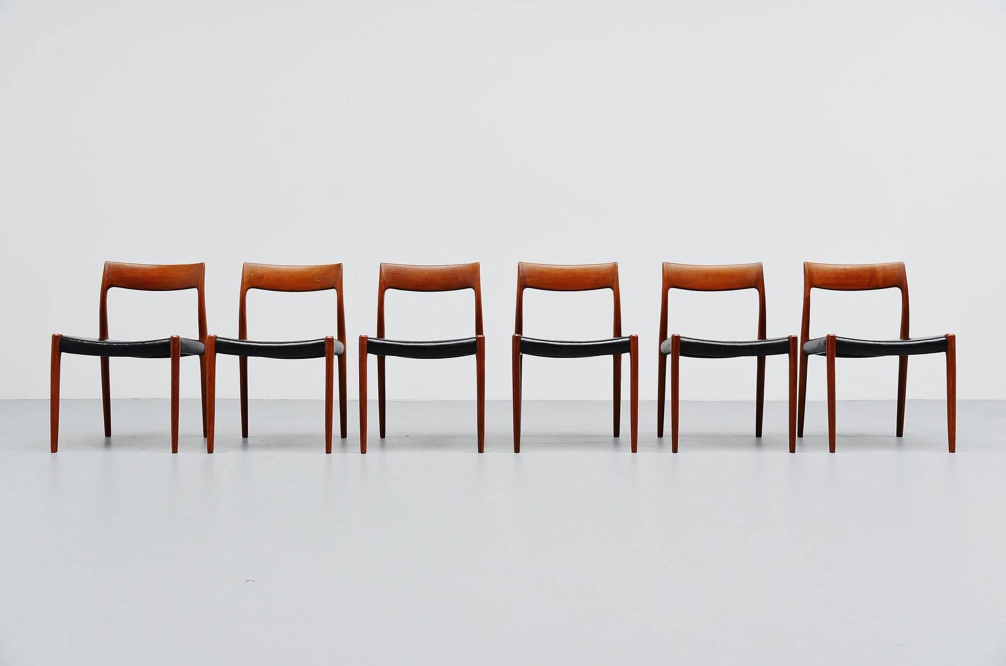 Very nice set of six dining chairs model 77 designed by Niels Moller for J.L. Møller Mobelfabrik, Denmark 1959. These chairs are made of solid teak wood and have original black leather upholstery that shows a very nice patina from age and usage. The