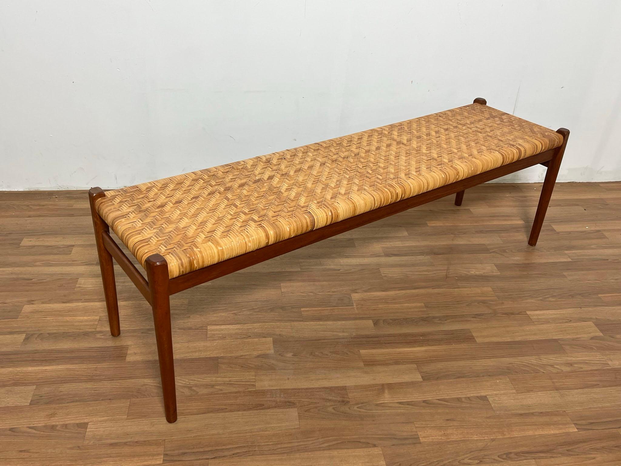Danish long bench with woven cane seat and teak frame, early version, by Niels O Moller for J.L. Moller circa 1960s.