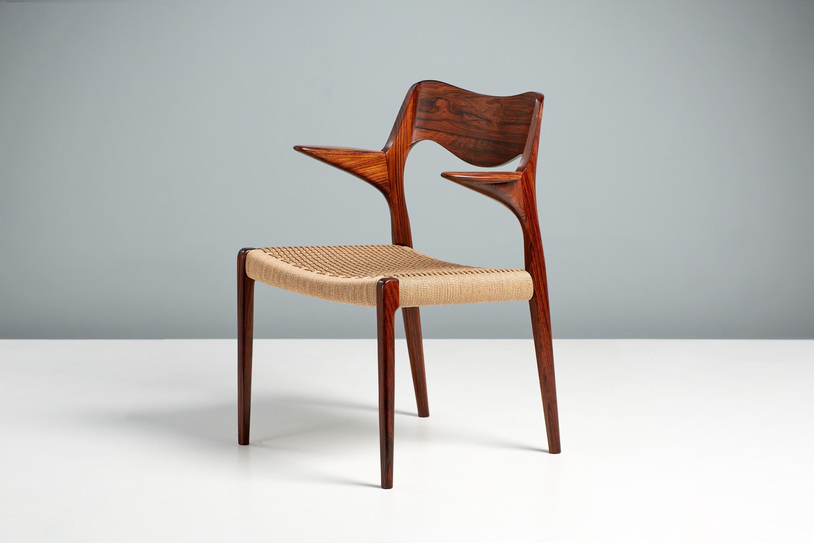 Niels Moller Model 55 Chair in Rosewood & Papercord, circa 1950s.

Rarely seen edition of this iconic design made from exquisite, highly figured rosewood. Designed by Niels Moller for his own company: J.L. Moller Mobelfabrik in Denmark, c1950s.