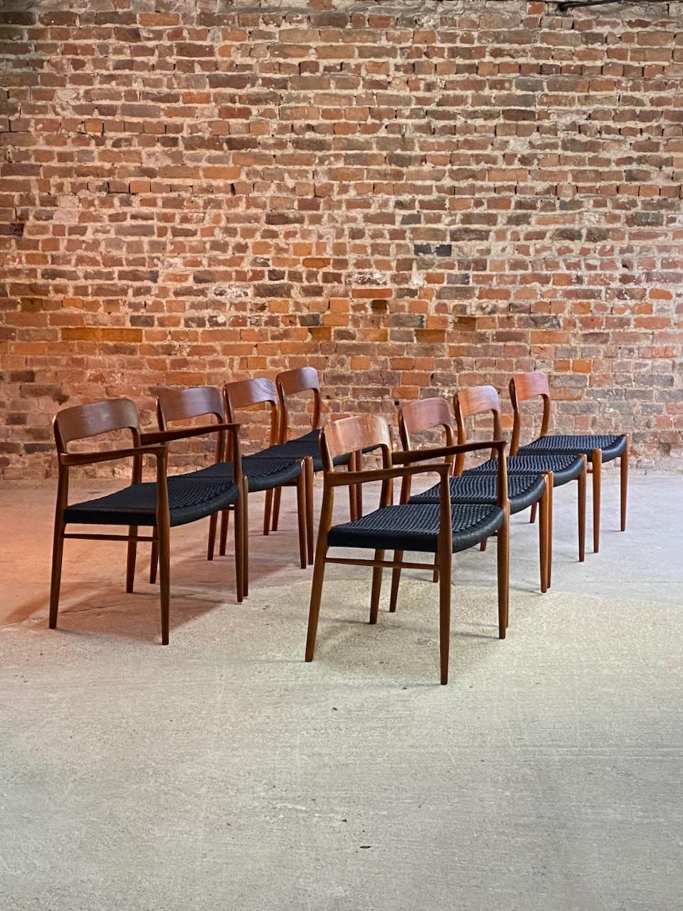 Niels Moller Model 56 & 75 Teak & Black Papercord Dining Chairs Set of 8

Magnificent set of eight Niels Otto Møller Model 56 (2) and Model 75 (6) Teak & Black papercord dining chairs manufactured by J.L. Møllers Møbelfabrik Denmark, circa 1960,