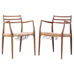 Paire de chaises de capitaine danoises en teck du milieu du siècle dernier, Niels Moller modèle 62