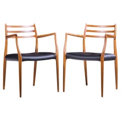 Sillas de capitán de teca danesa de mediados de siglo Niels Moller Model 62 - Pareja