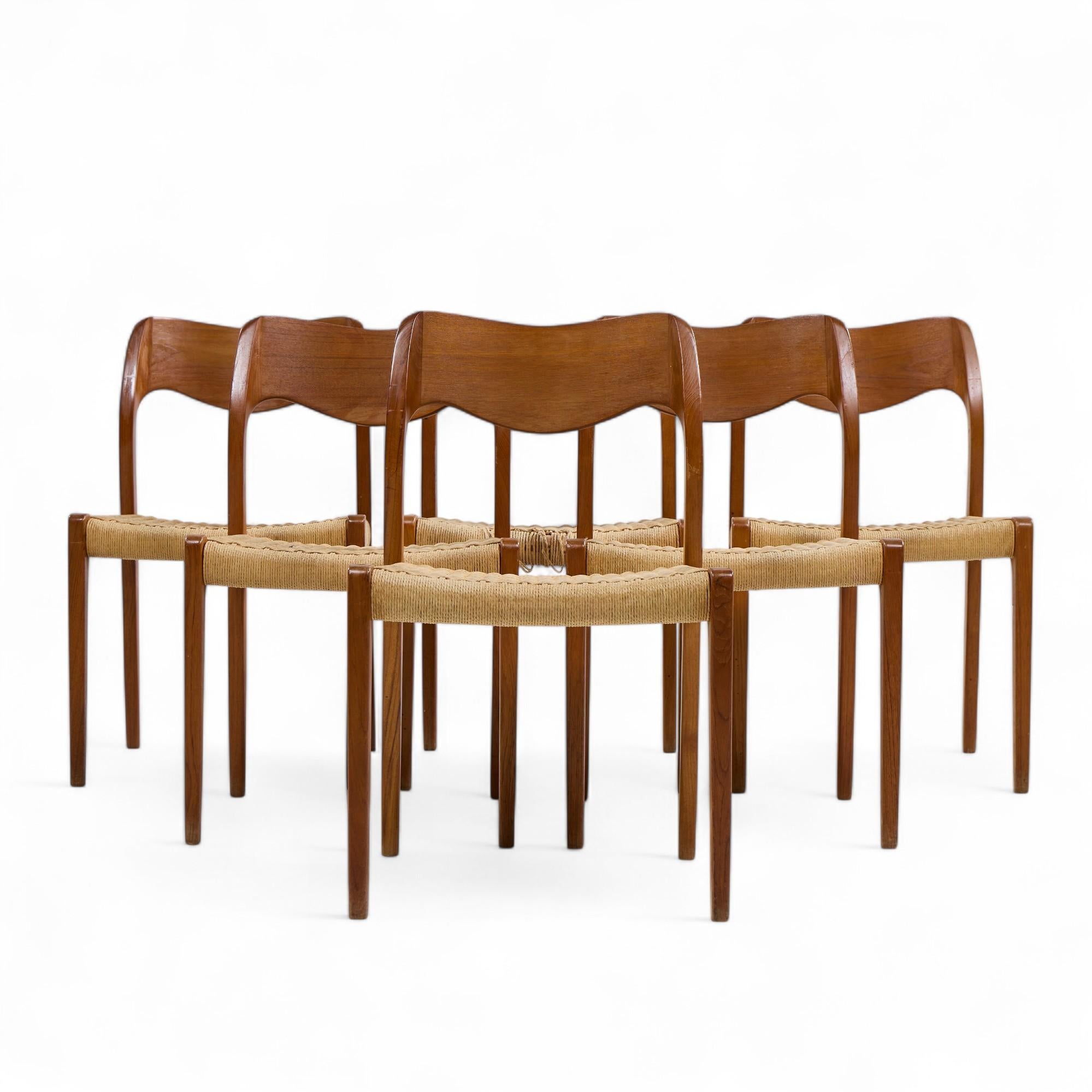 Niels Moller Model 71 Mid Century Danish Teak and Paper Cord Dining Chairs - Set of 6

Each chair measures: 19.5 wide x 19.5 deep x 31.25 inches high, with a seat height/chair clearance of 18 inches

All pieces of furniture can be had in what we